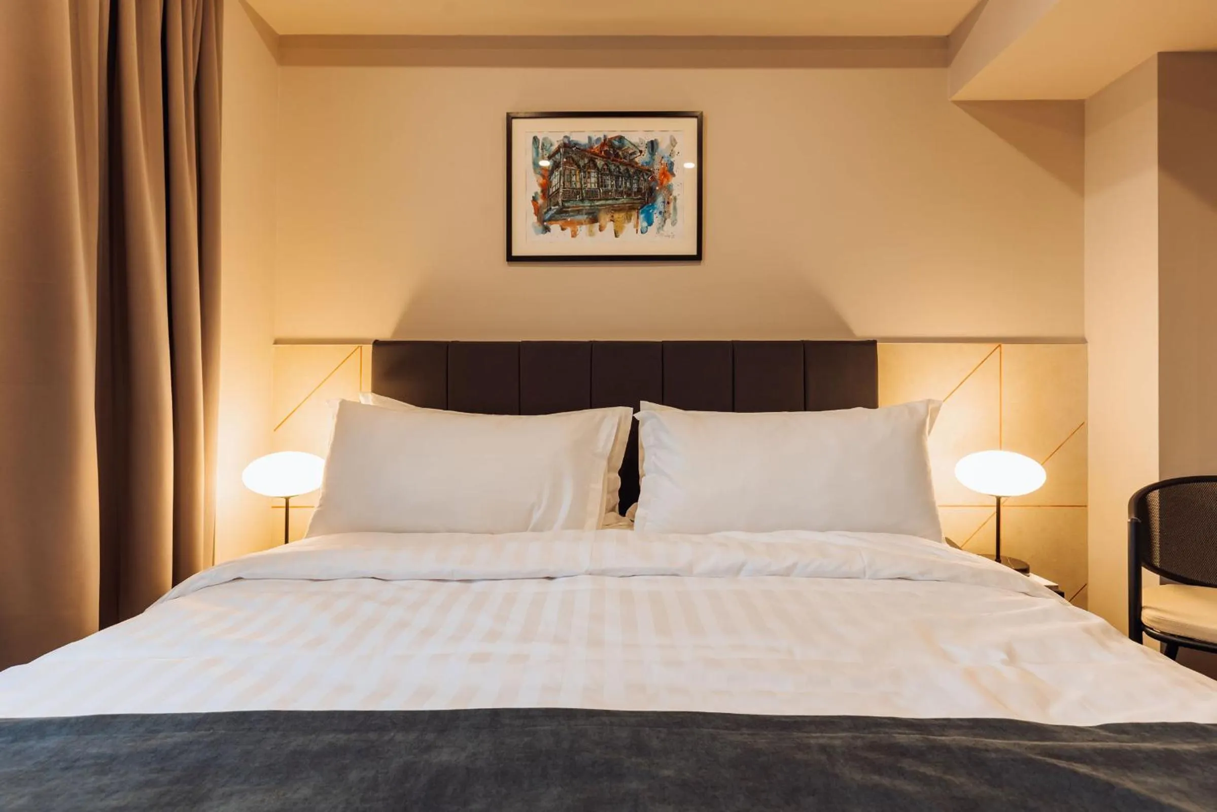 Bed in Reikartz King Tamar Tbilisi