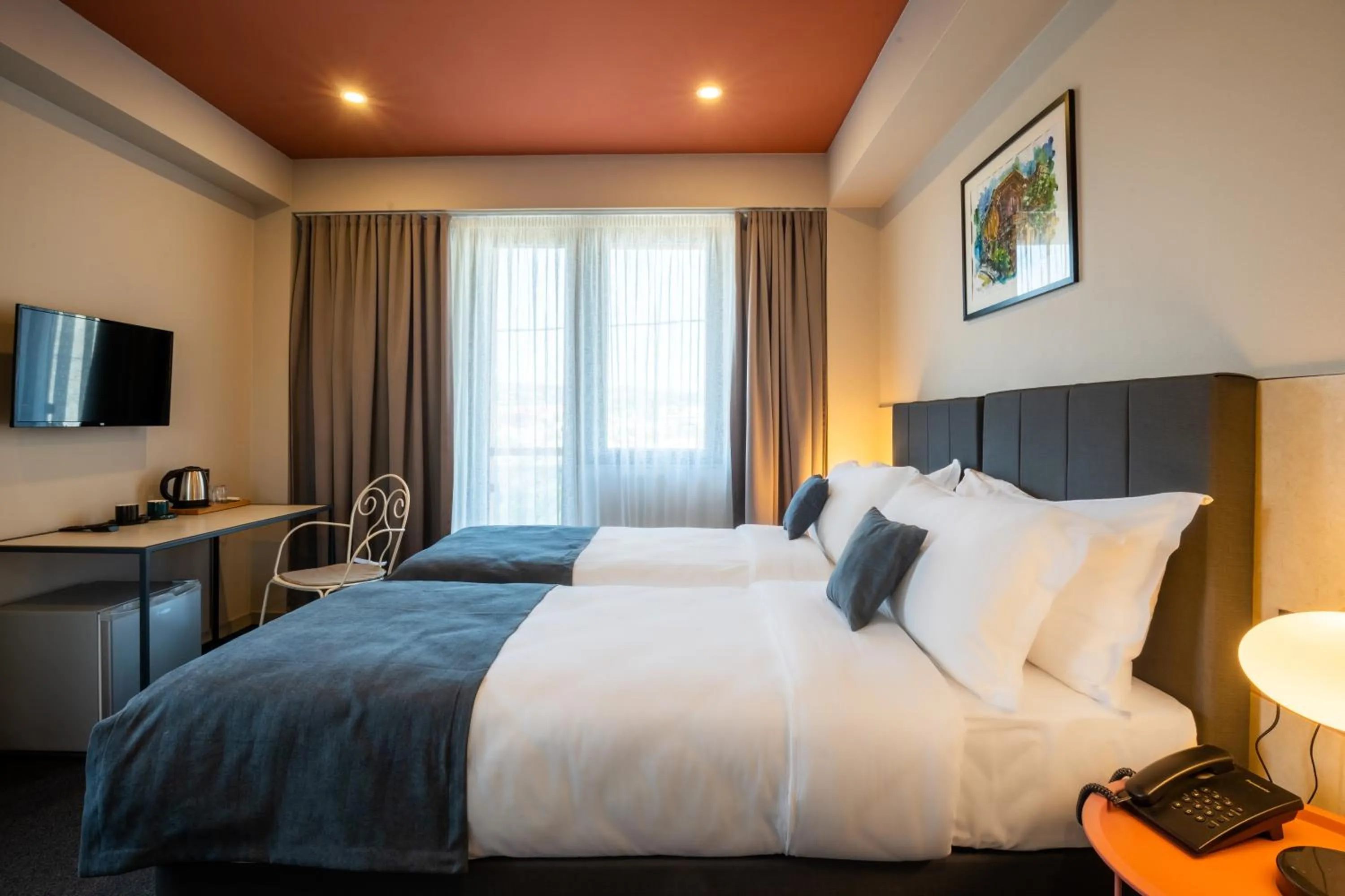 Bed in Reikartz King Tamar Tbilisi