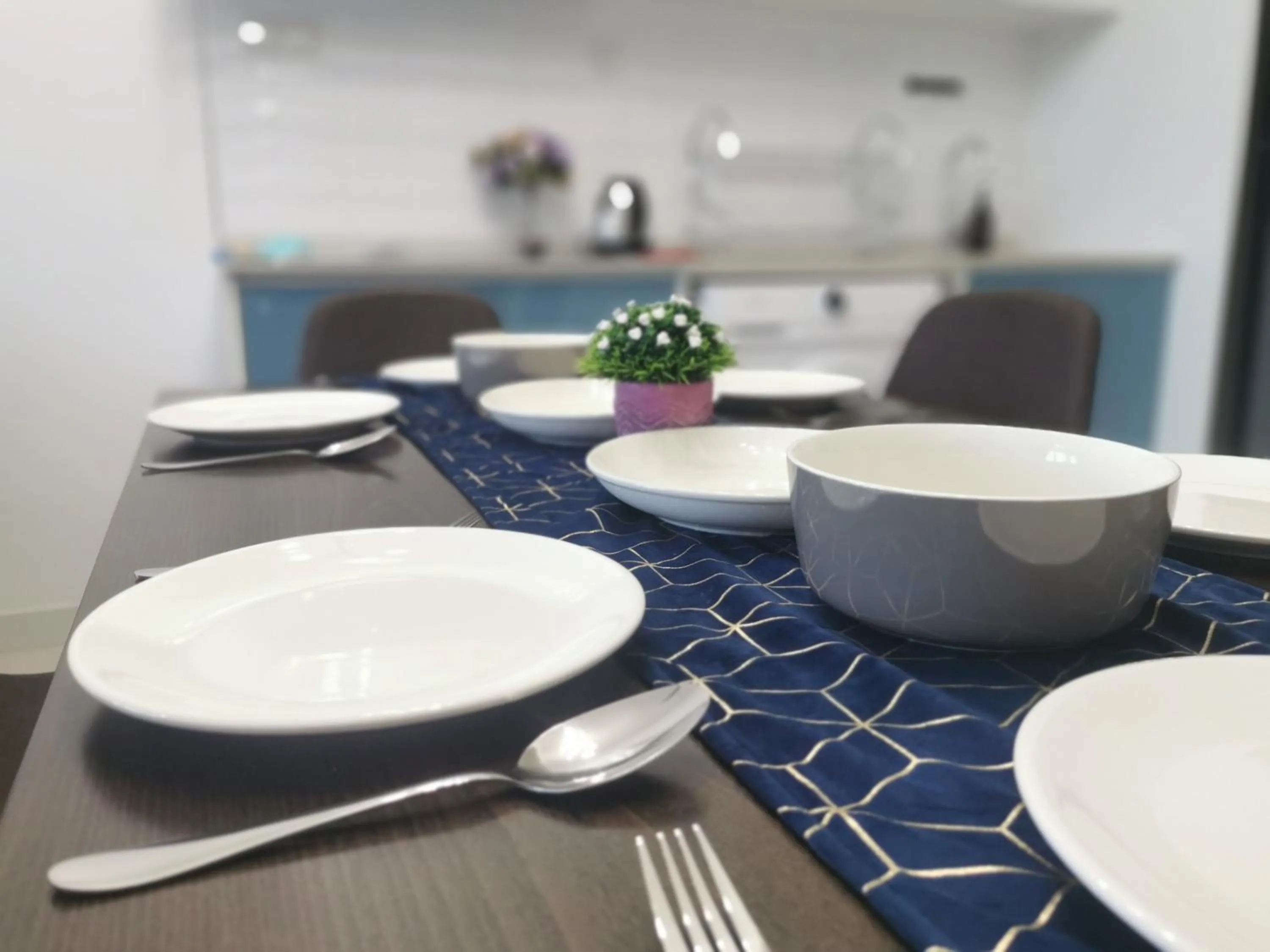 Dining area in Continew Residence by HomeBrickz