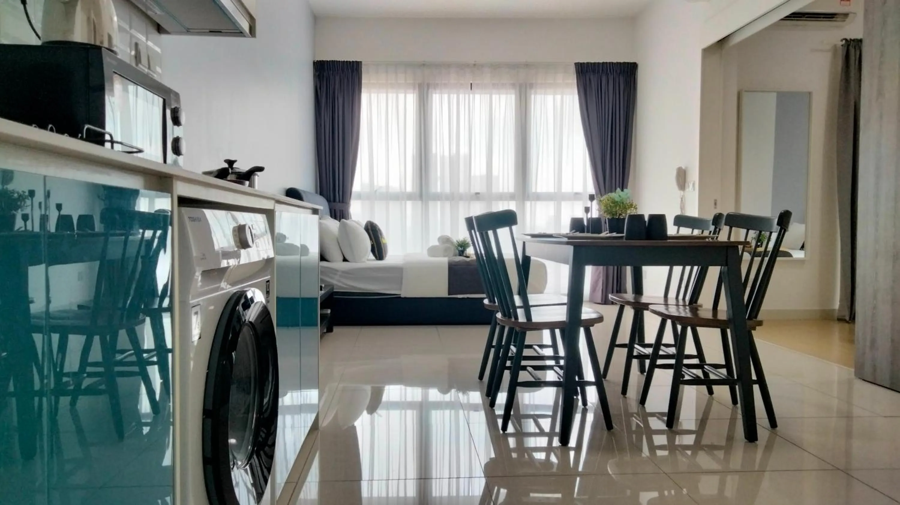 Kitchen or kitchenette in Continew Residence by HomeBrickz