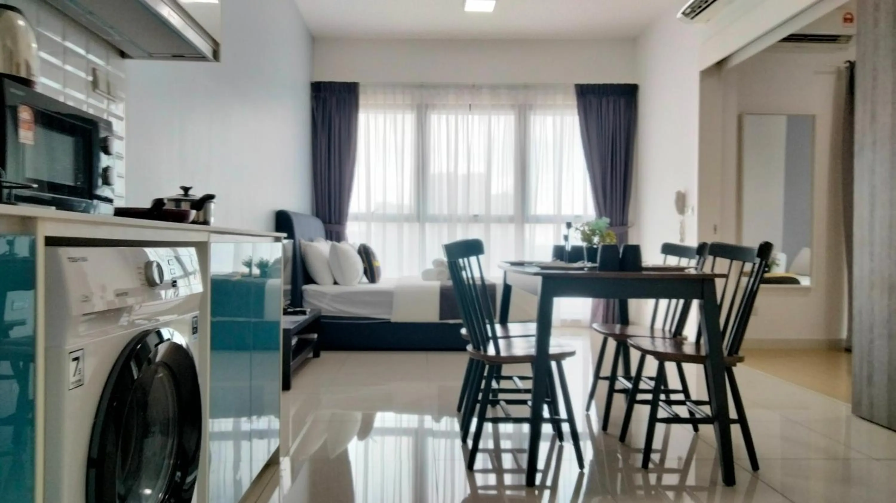 Kitchen or kitchenette in Continew Residence by HomeBrickz