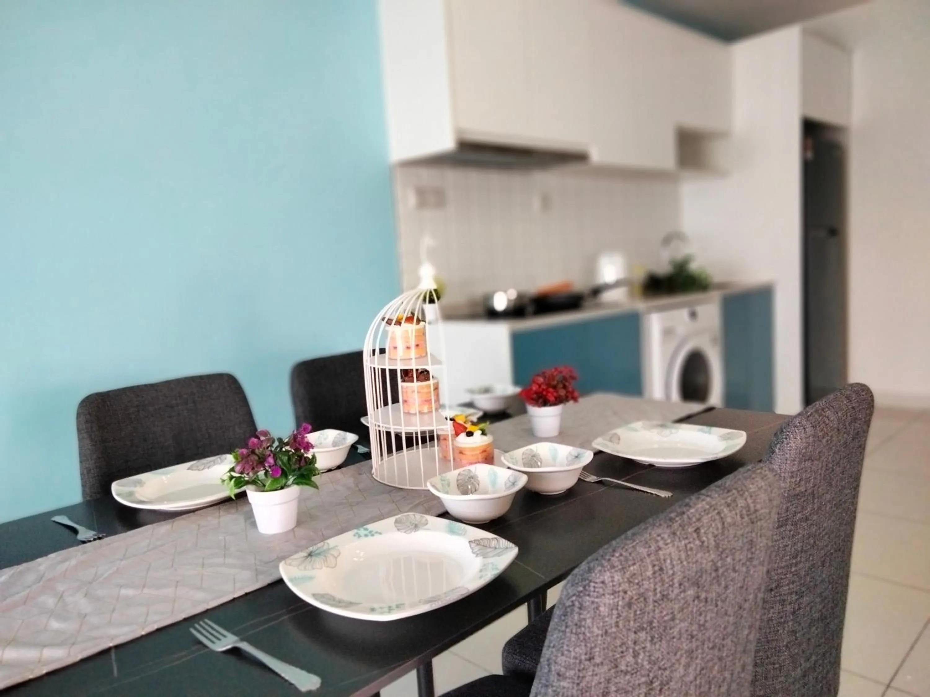 Dining area in Continew Residence by HomeBrickz