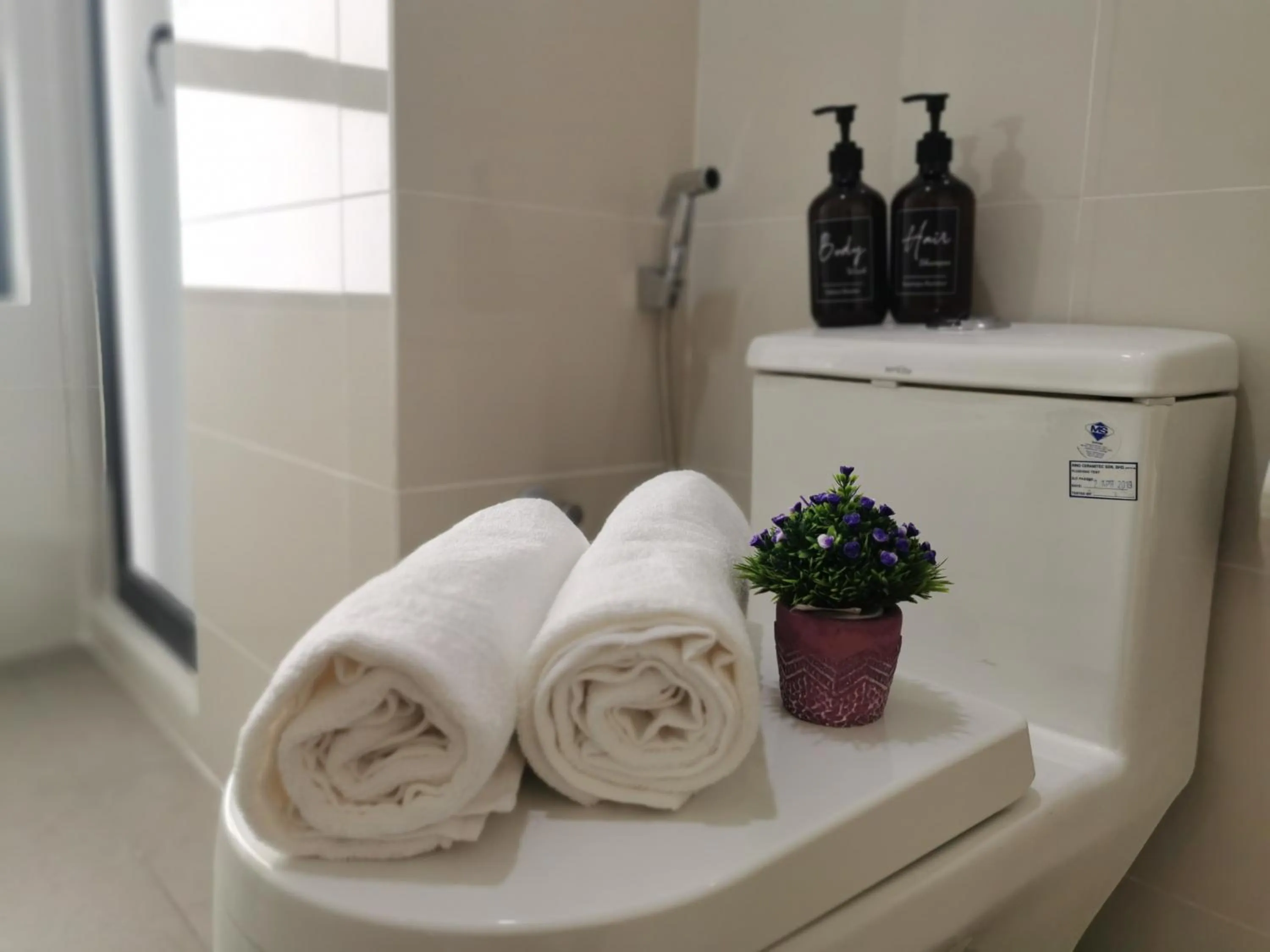 Bathroom in Continew Residence by HomeBrickz
