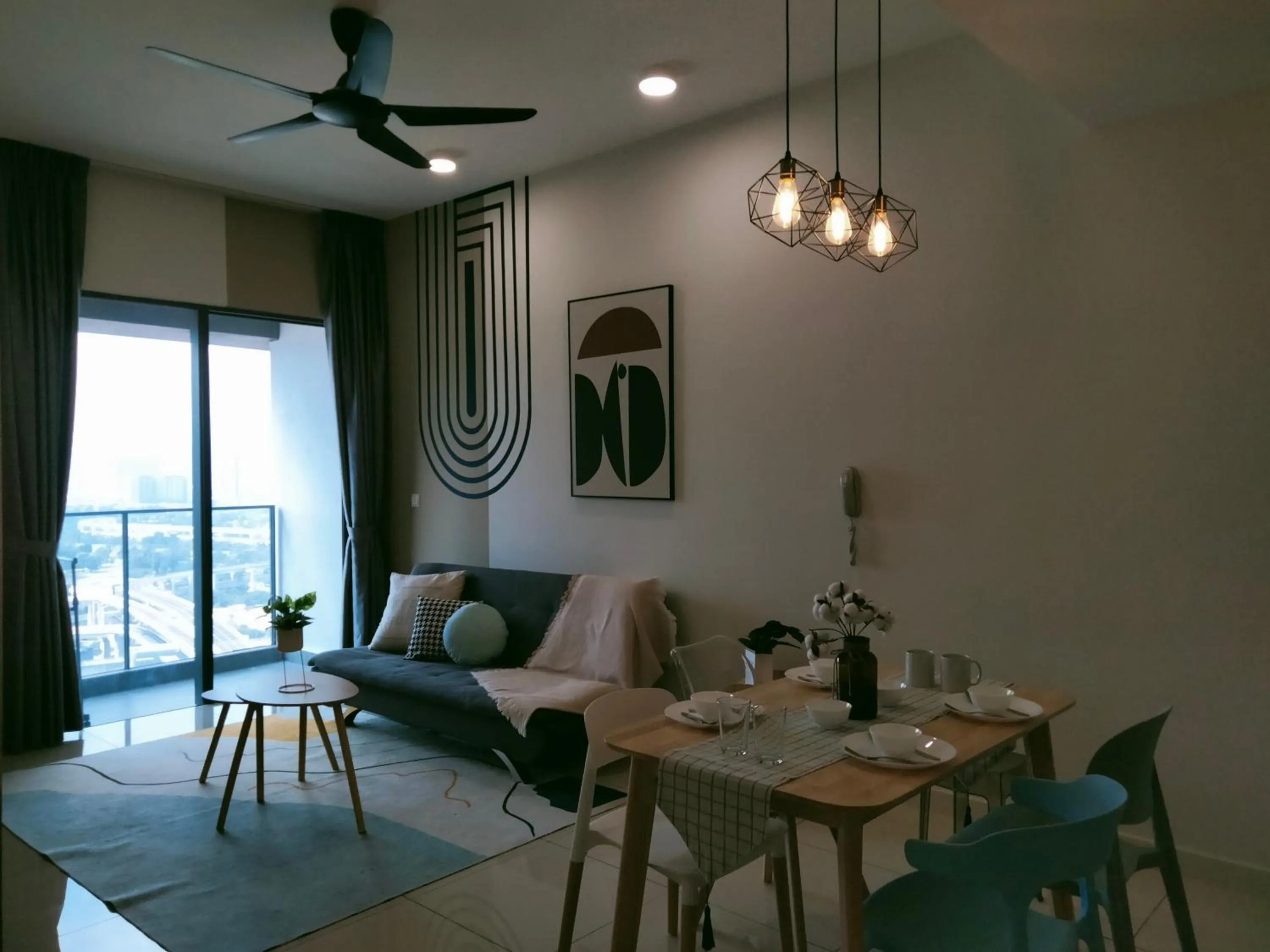 Living room in Continew Residence by HomeBrickz