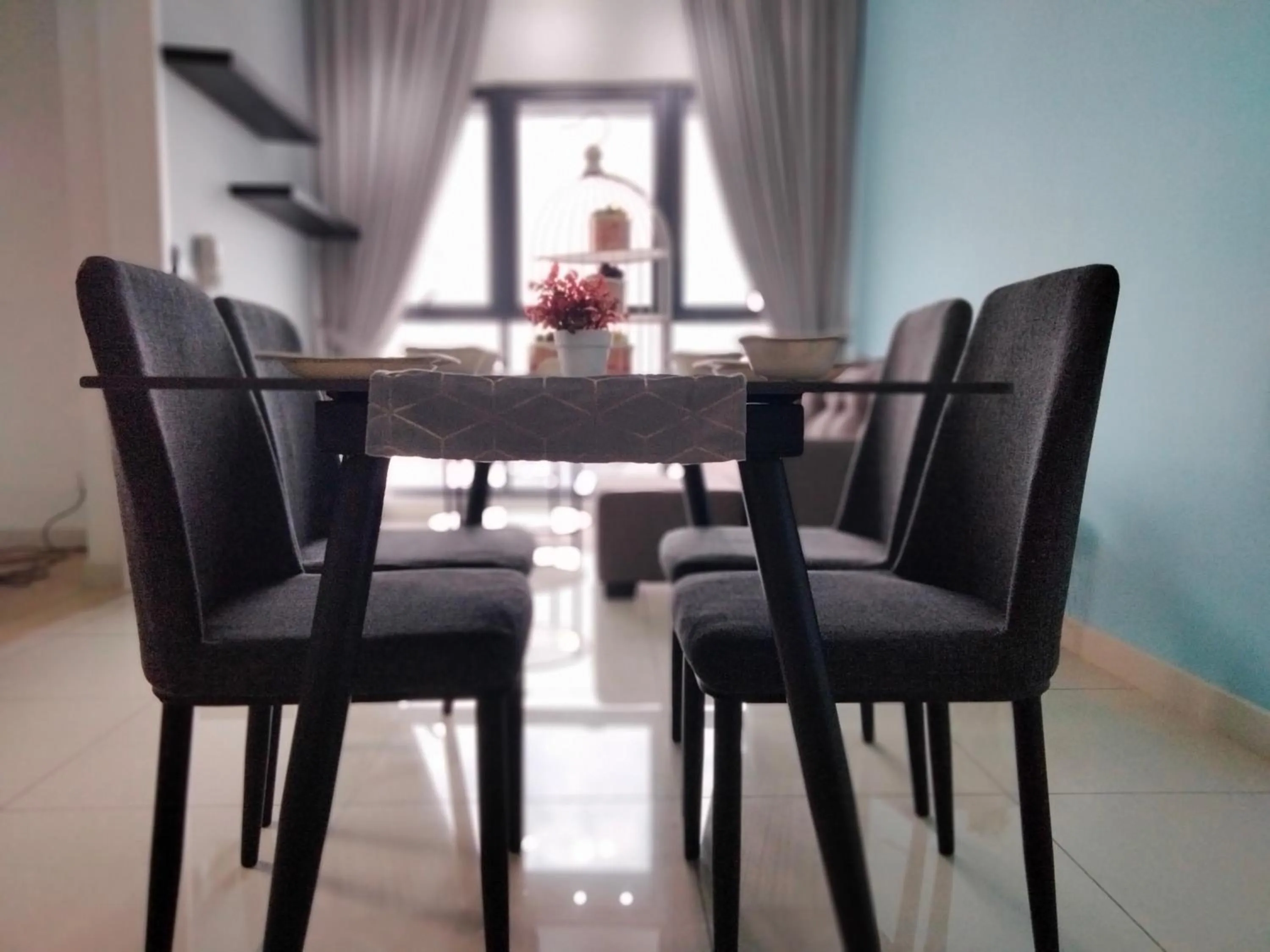 Dining area in Continew Residence by HomeBrickz