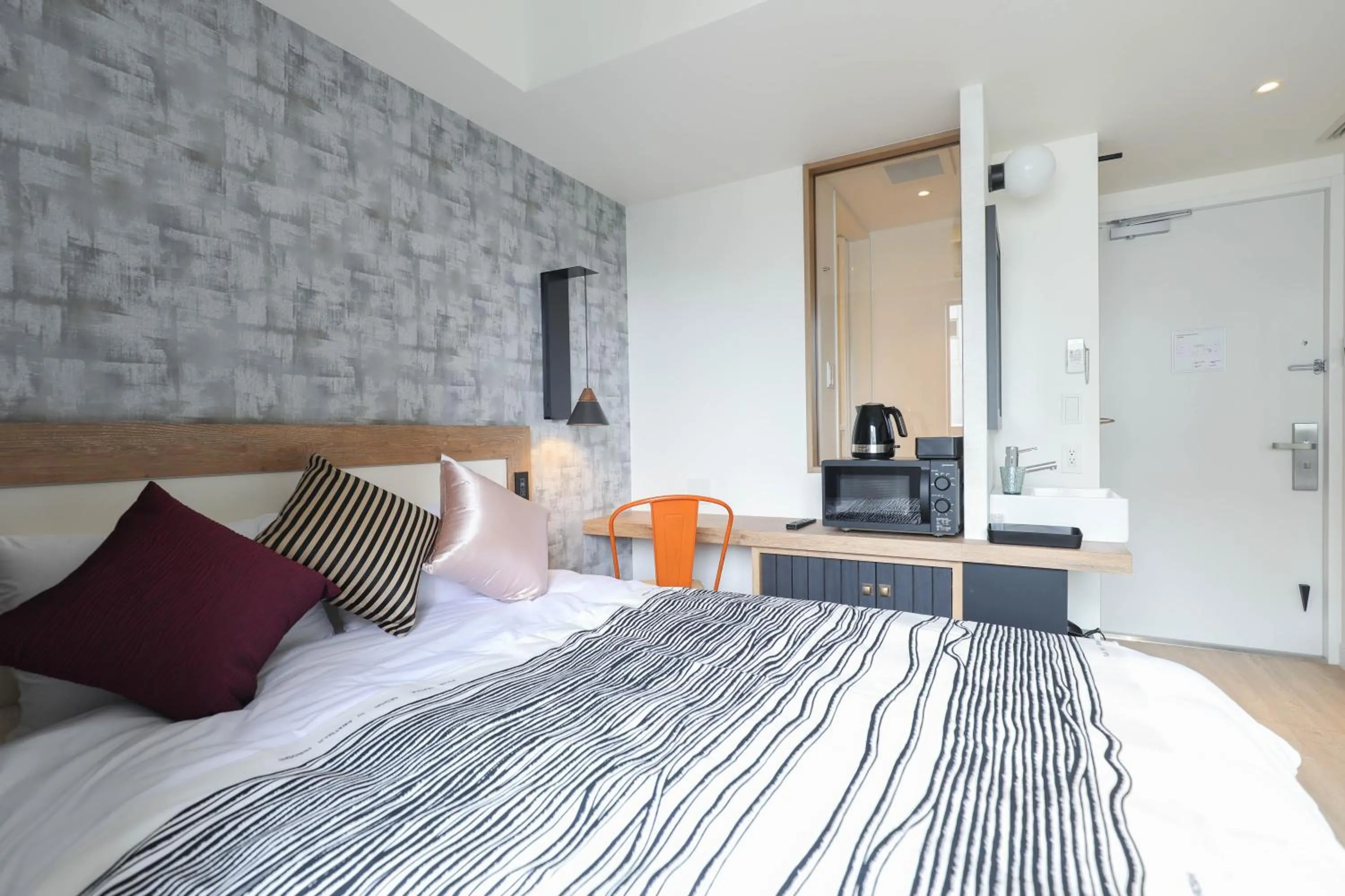 Bed in FFFFFF Hotel エフホテル