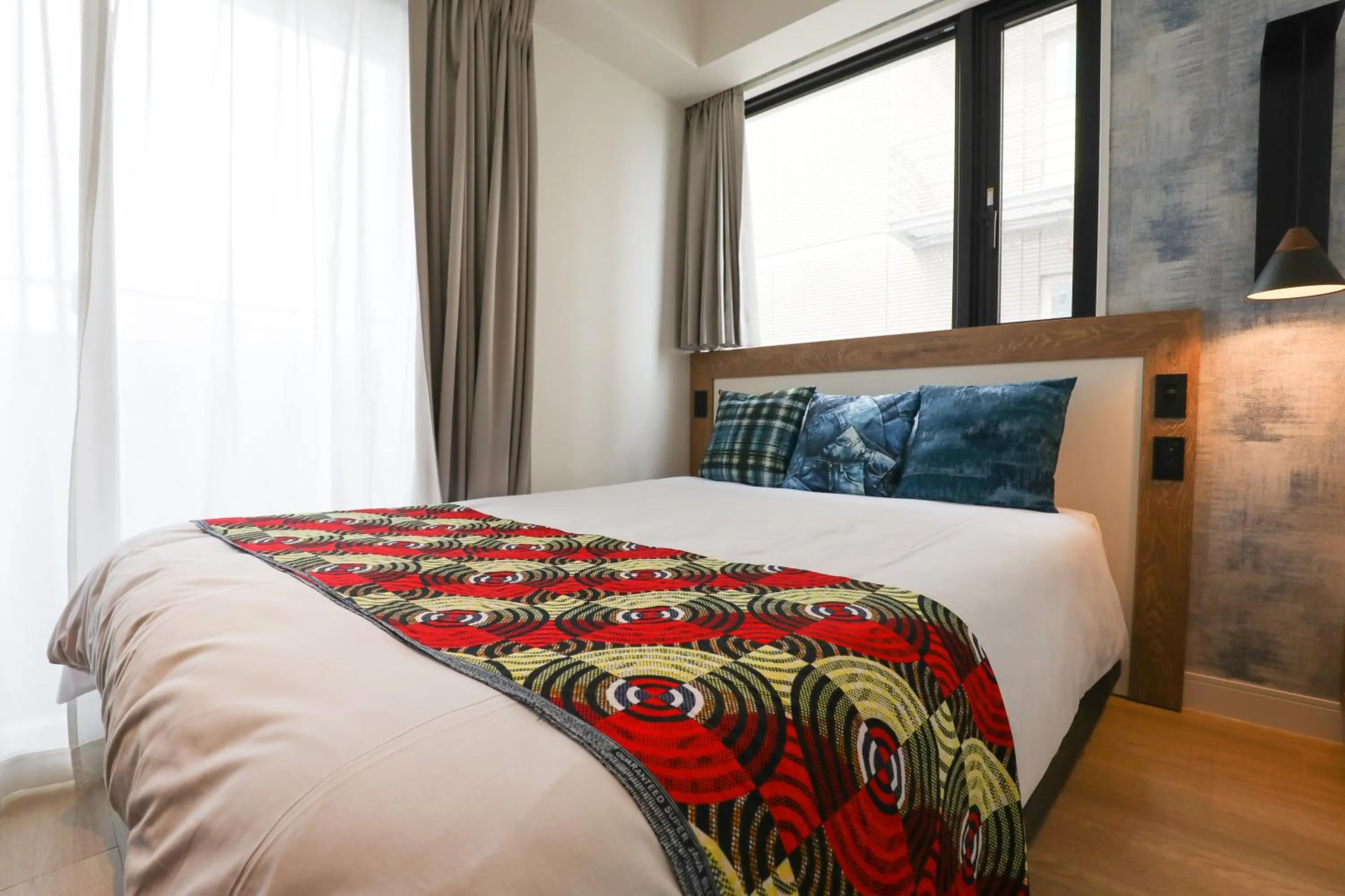 Bed in FFFFFF Hotel エフホテル