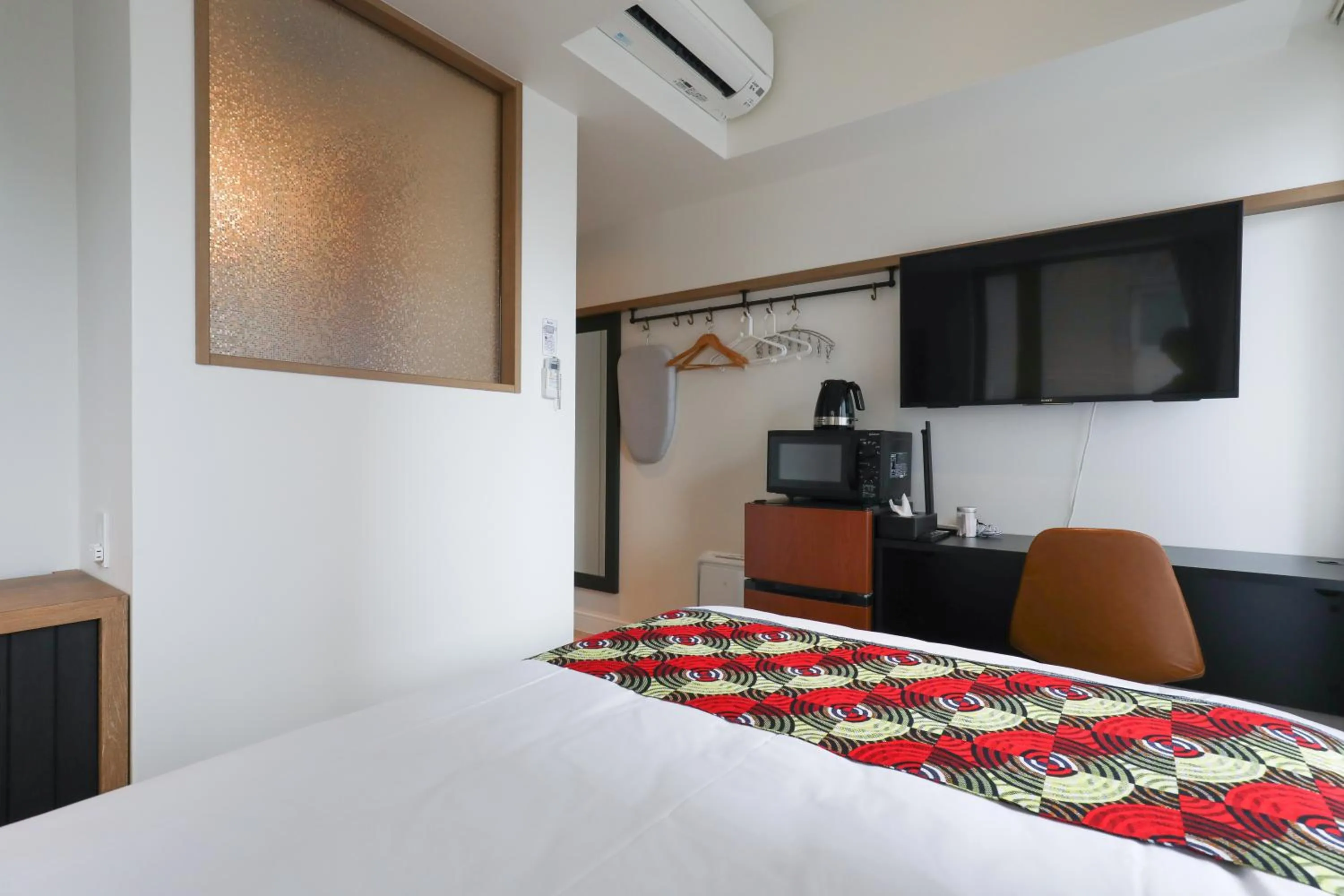 Bed in FFFFFF Hotel エフホテル