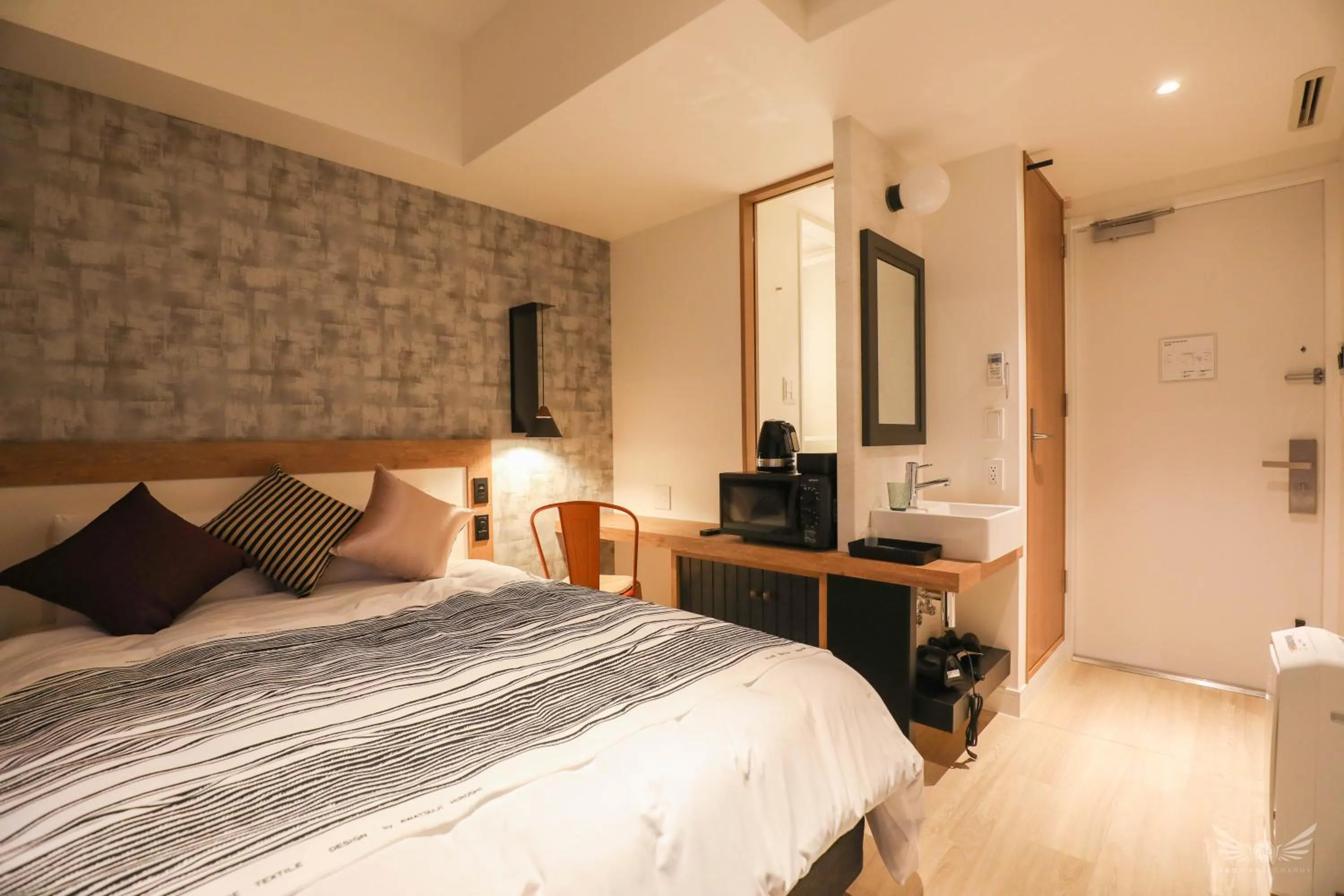 Bed in FFFFFF Hotel エフホテル