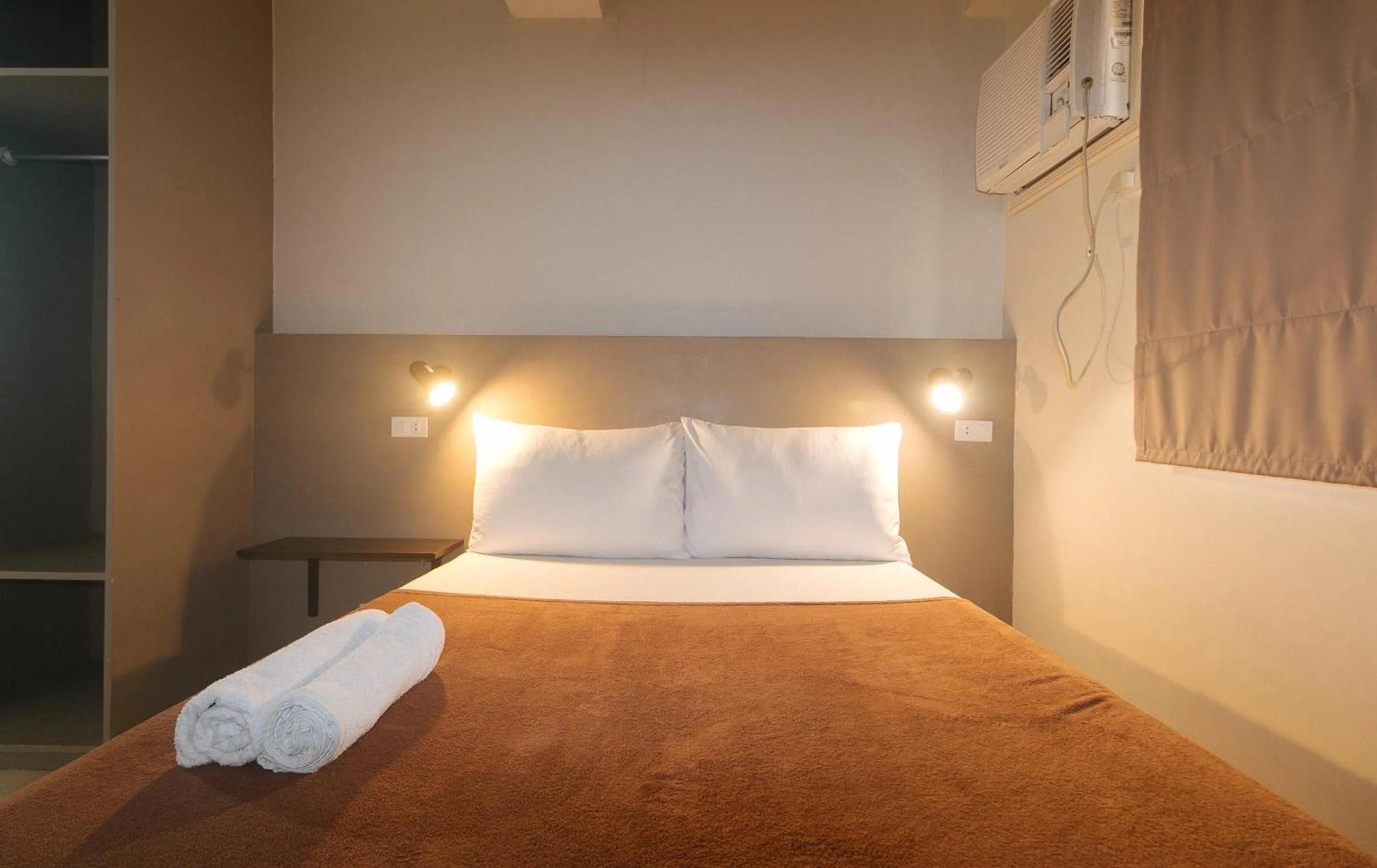 Bed in 59 Xavierville by RedDoorz