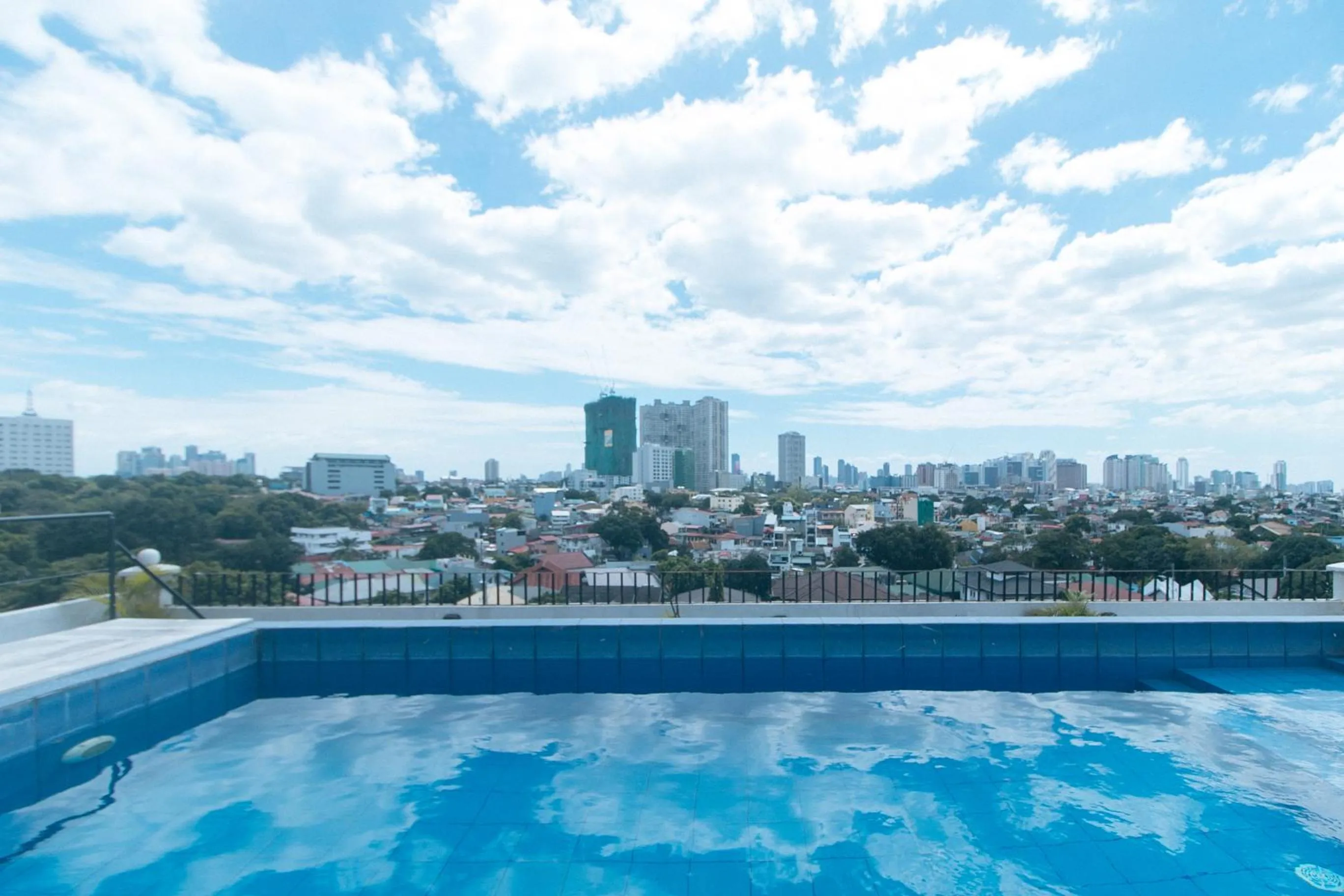 Pool view in 59 Xavierville by RedDoorz