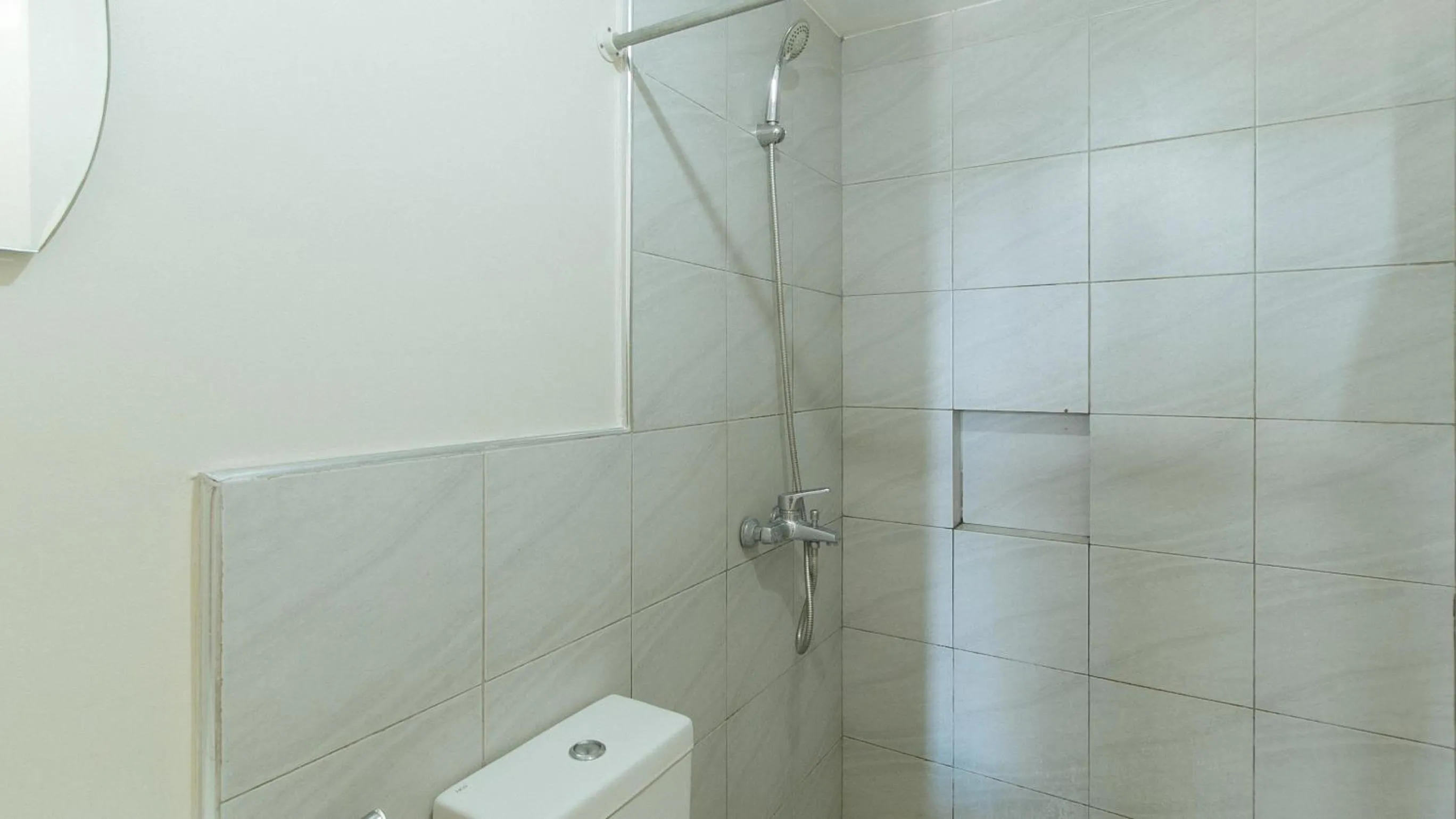 Shower in 59 Xavierville by RedDoorz