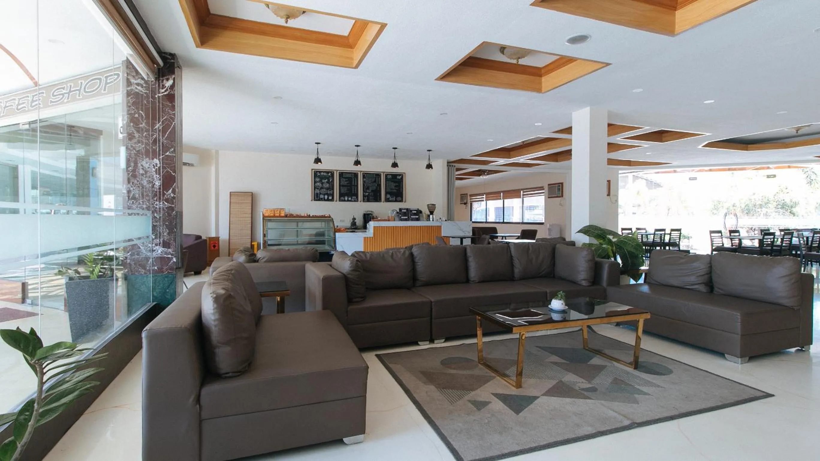 Living room in RedDoorz Premium @ Nick Hotel Gerona Tarlac