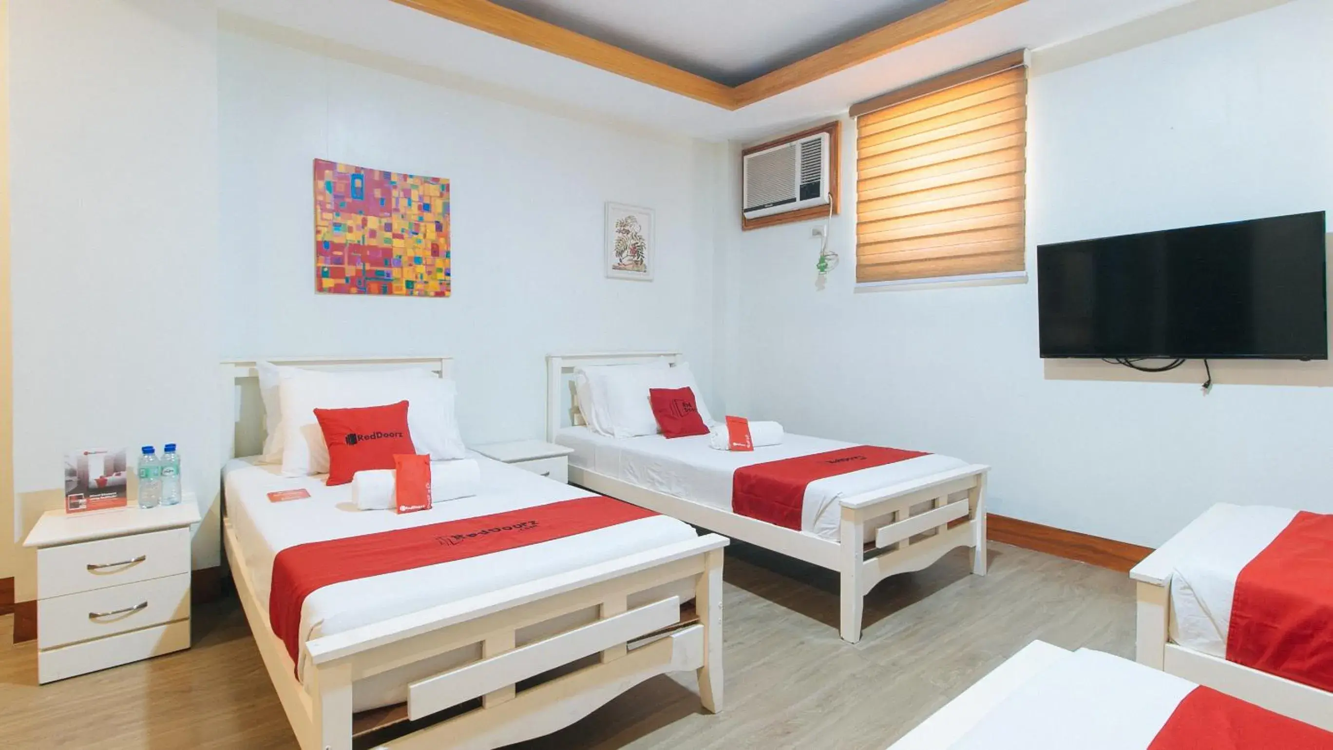 Quadruple Room in RedDoorz Premium @ Nick Hotel Gerona Tarlac Quadruple Room in RedDoorz Premium @ Nick Hotel Gerona Tarlac