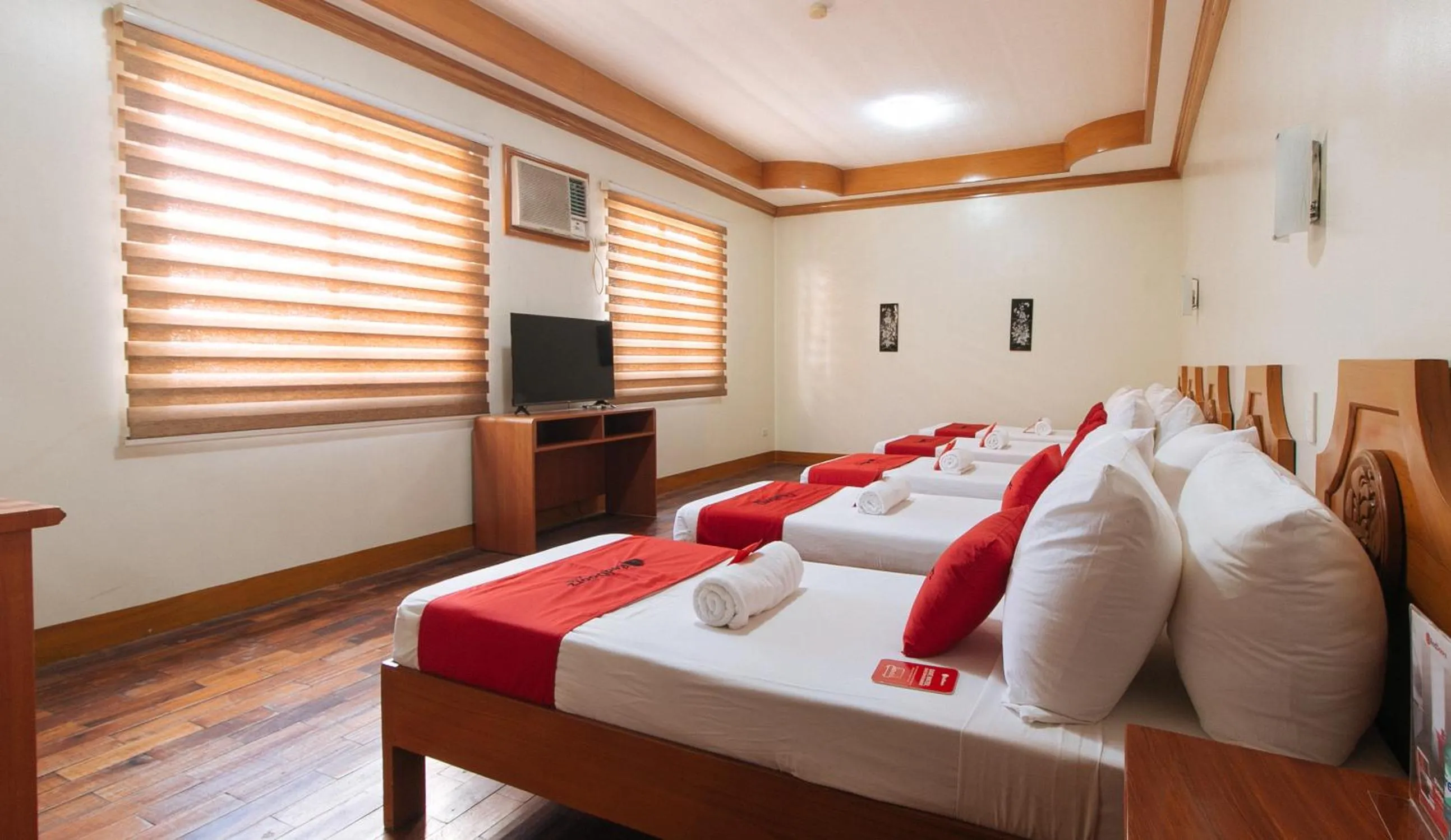 Bed in RedDoorz Premium @ Nick Hotel Gerona Tarlac