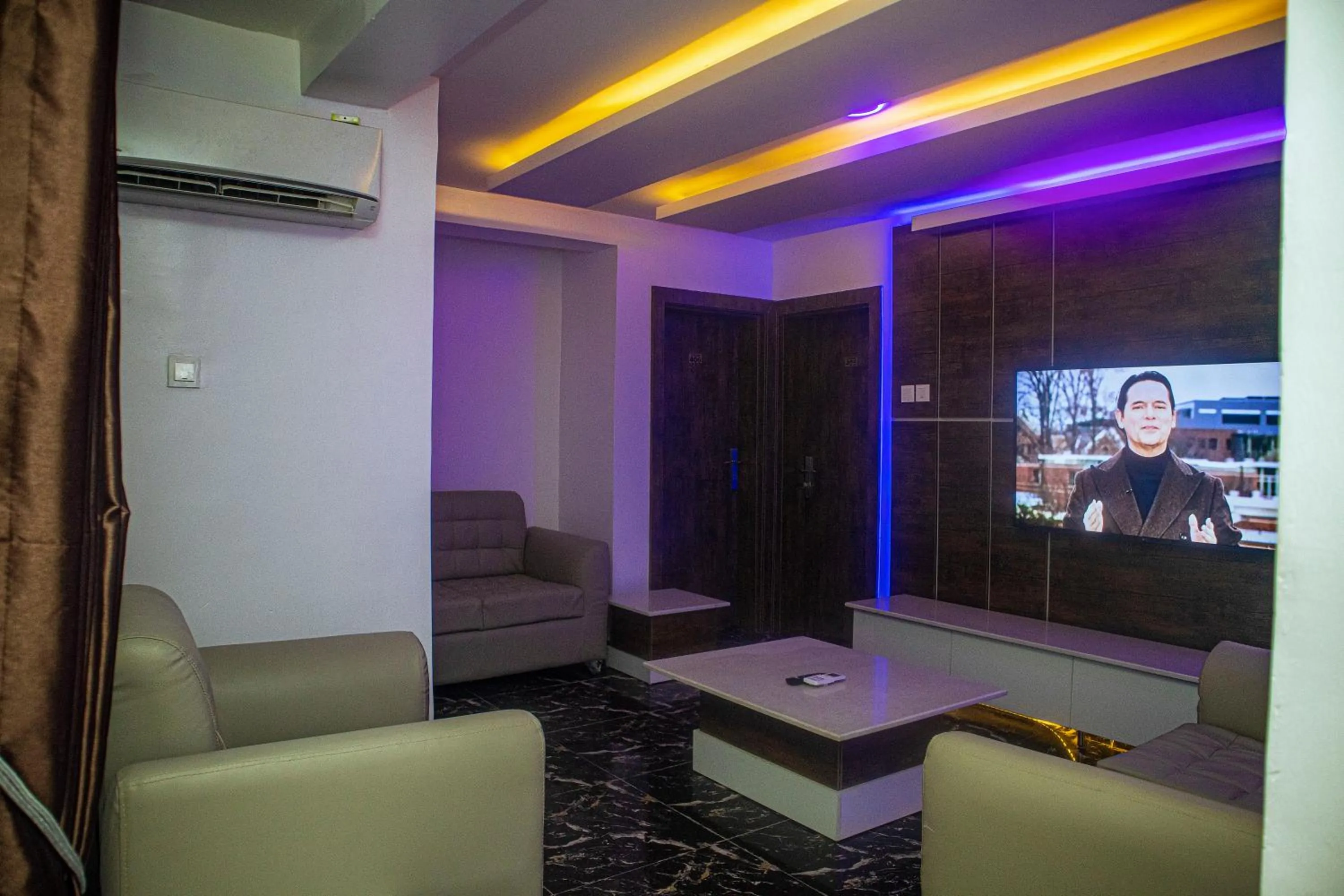 Communal lounge/ TV room in Presken Hotel Fajodd-4, Allen, Ikeja, Lagos
