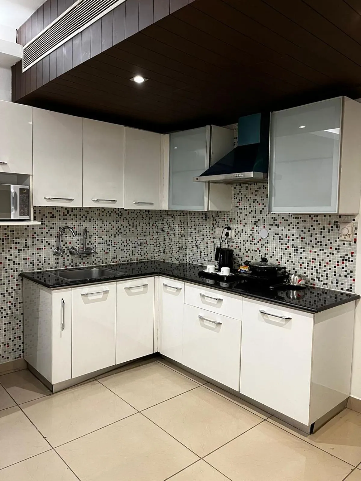 Kitchen or kitchenette in Yuhi Suites