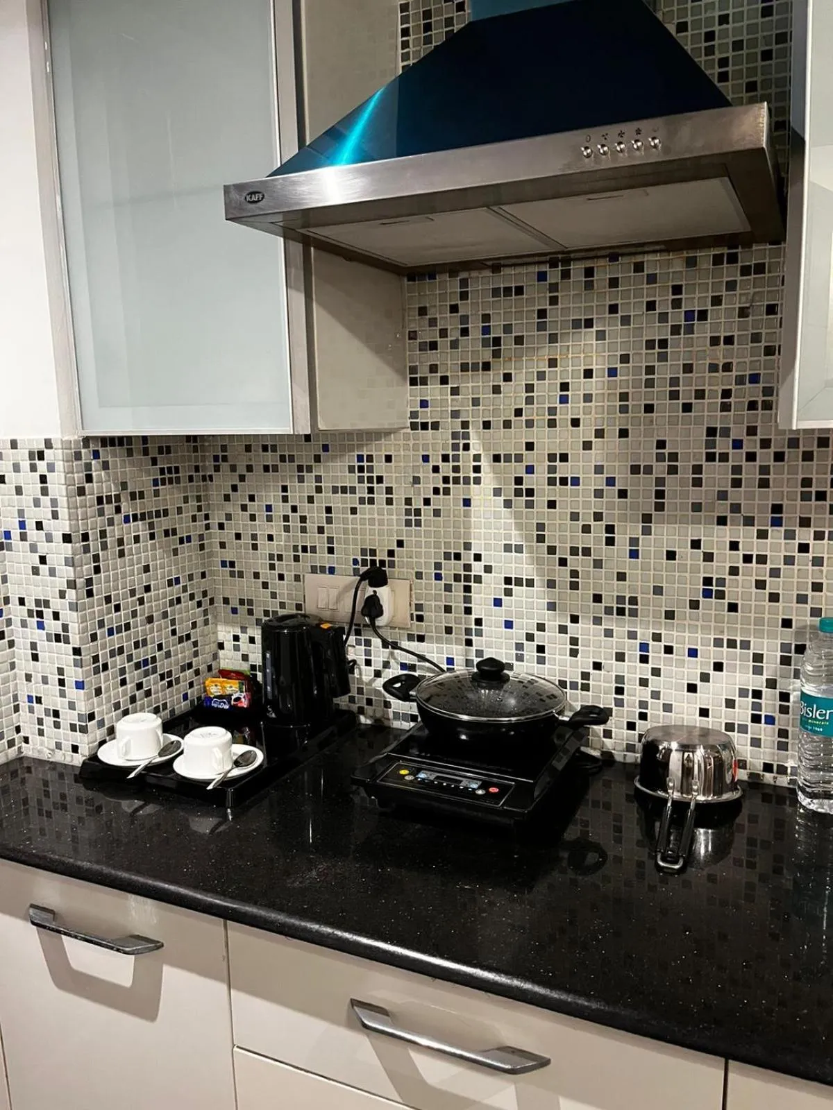 Communal kitchen in Yuhi Suites