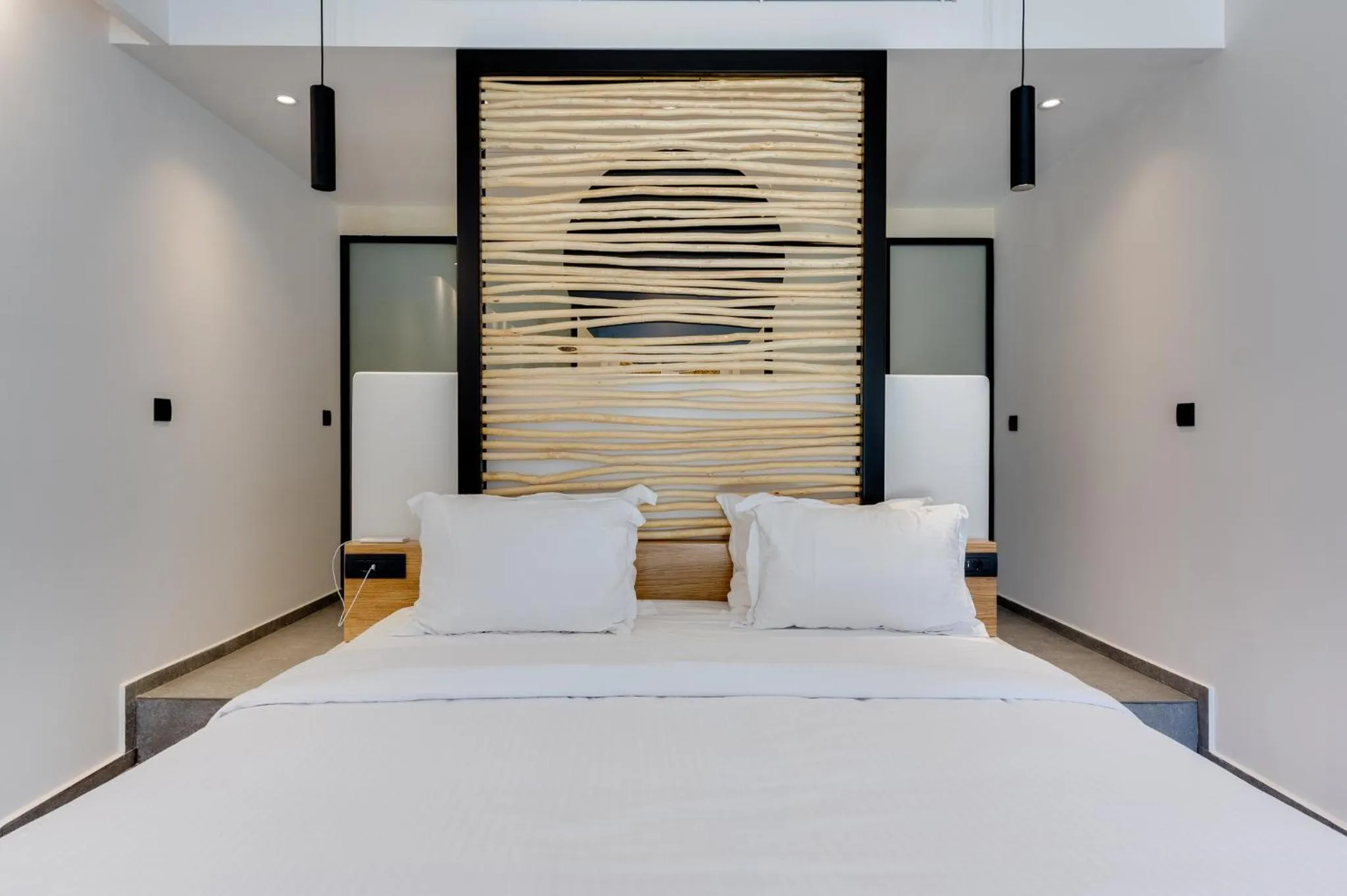 Bed in Elements Cozy Suites Pyrgos