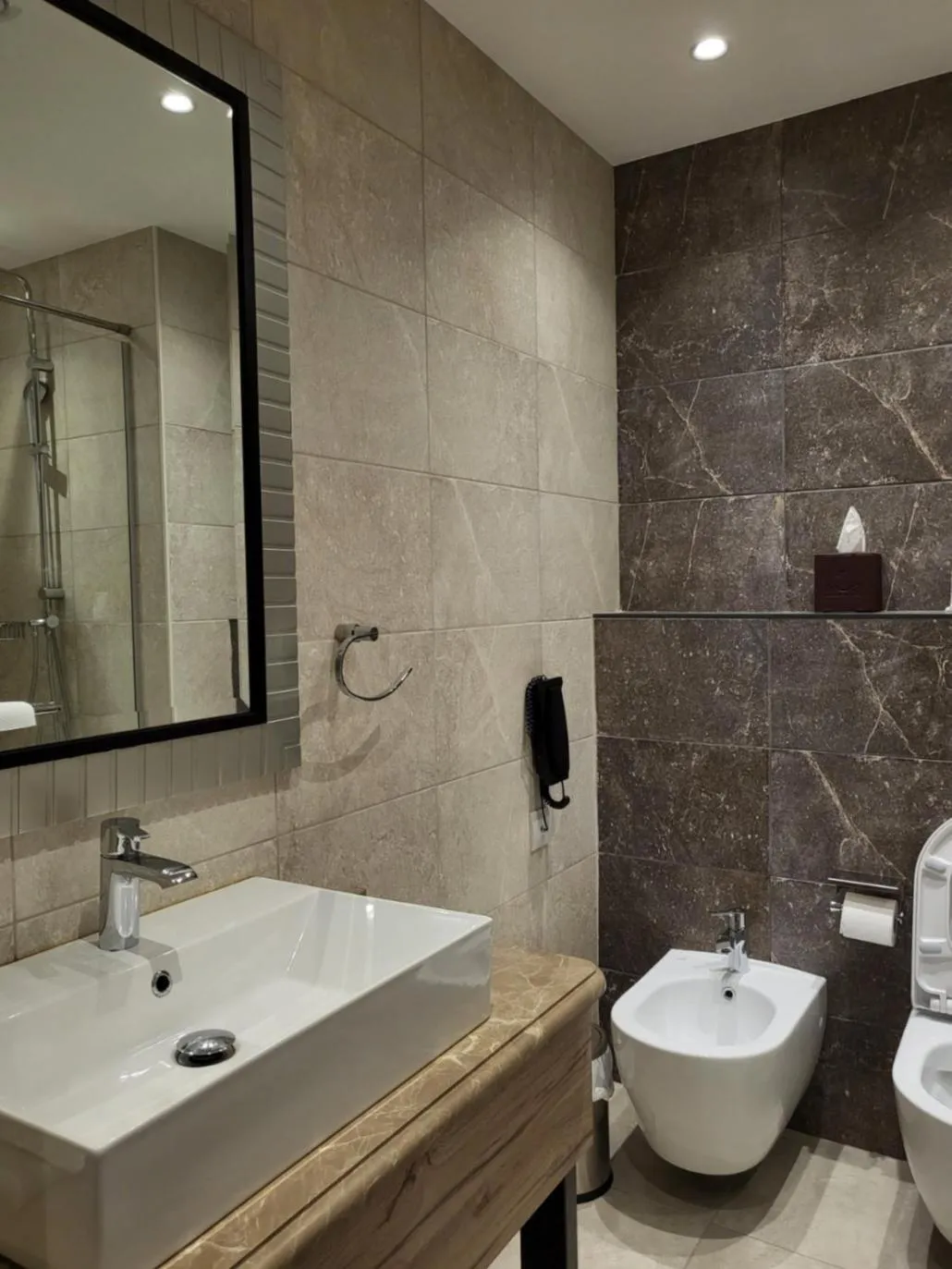 Bathroom in Ambassador, a Boutique Hotel