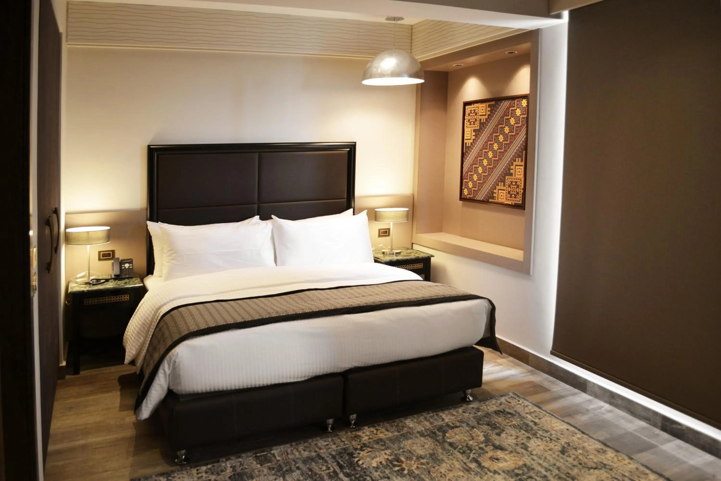 Bedroom, Bed in Ambassador, a Boutique Hotel