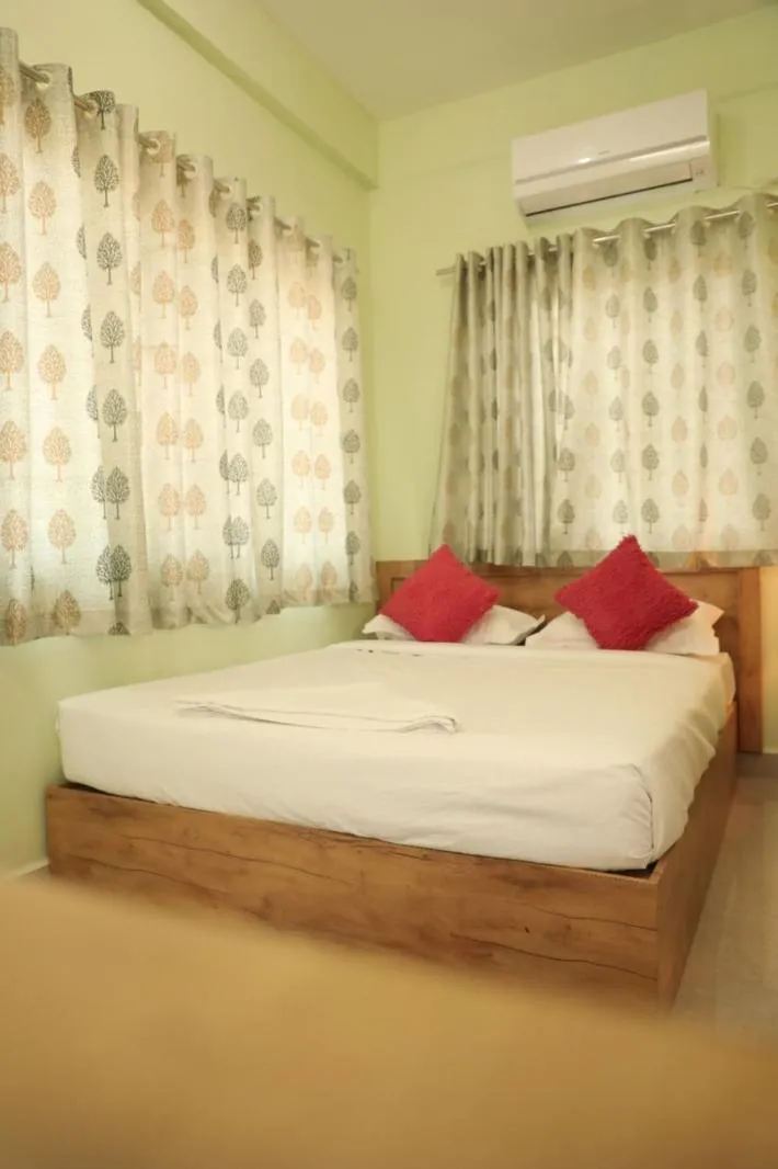 Bedroom, Bed in Sai Inn Mysore