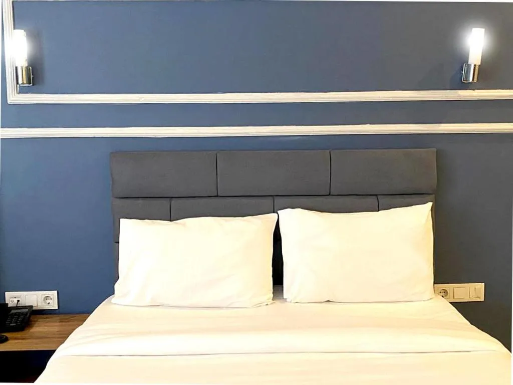 Bed in iNALENS AİRPORT HOTEL