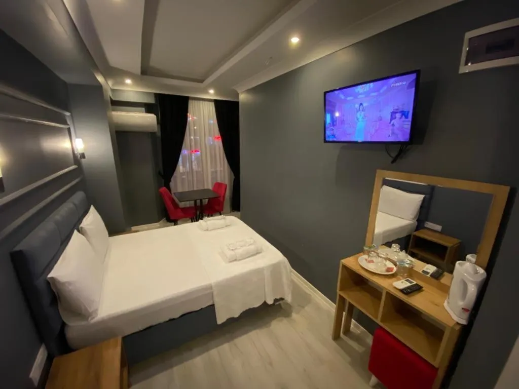 Bed in iNALENS AİRPORT HOTEL