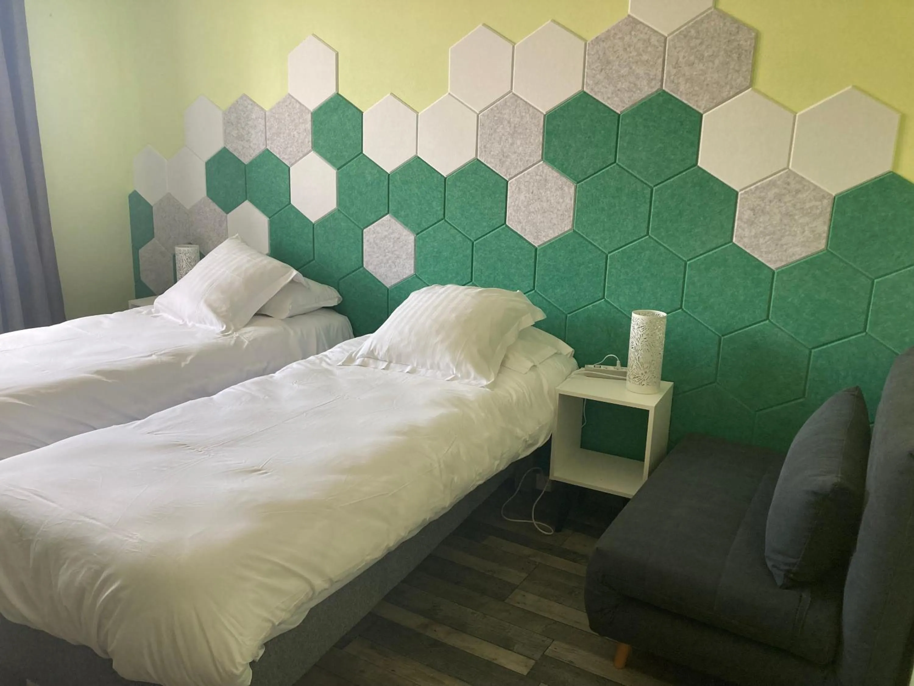 Bedroom in Logis Hôtel Restaurant Le 1050