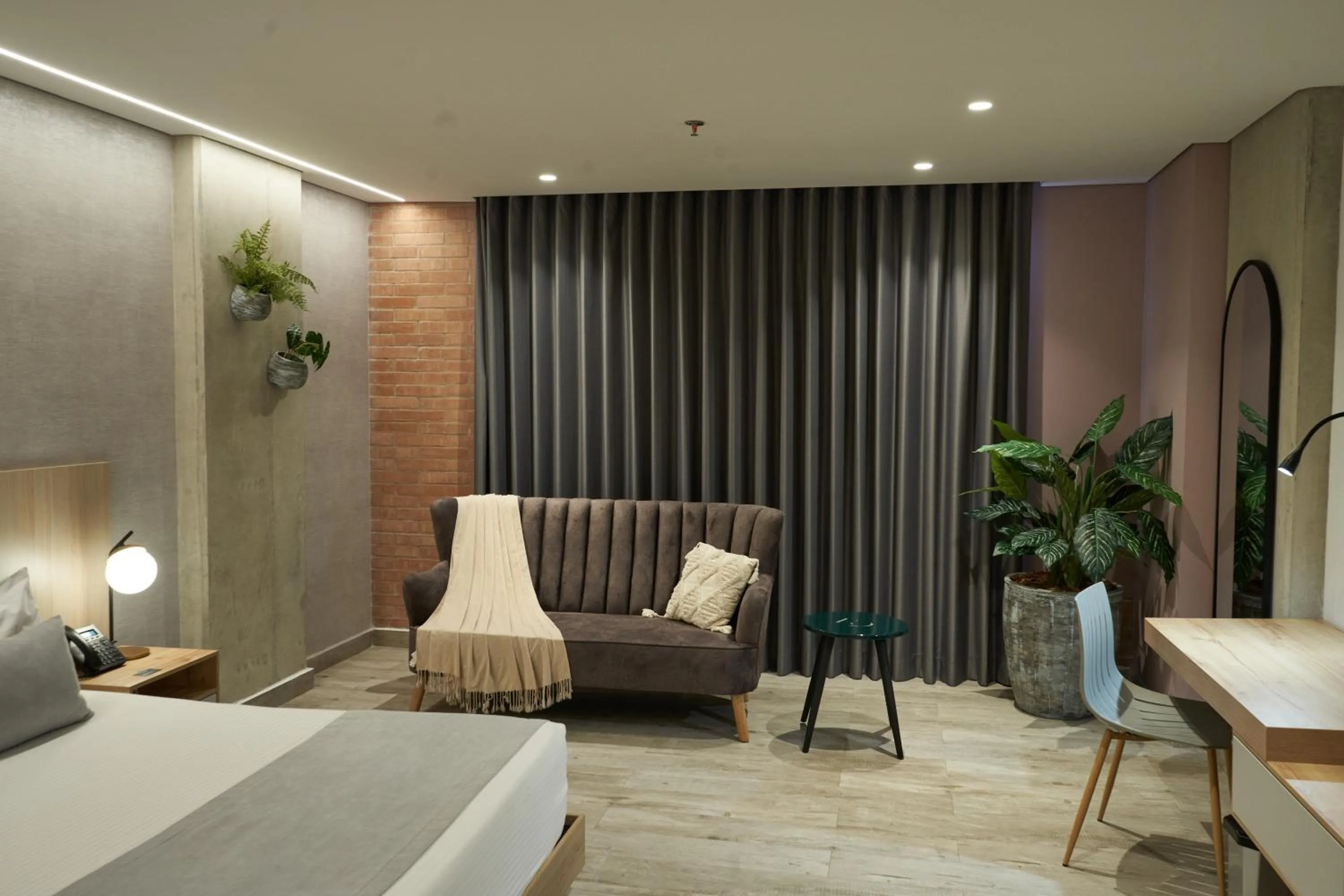 Photo of the whole room, Bed in Eutopiq Hotel