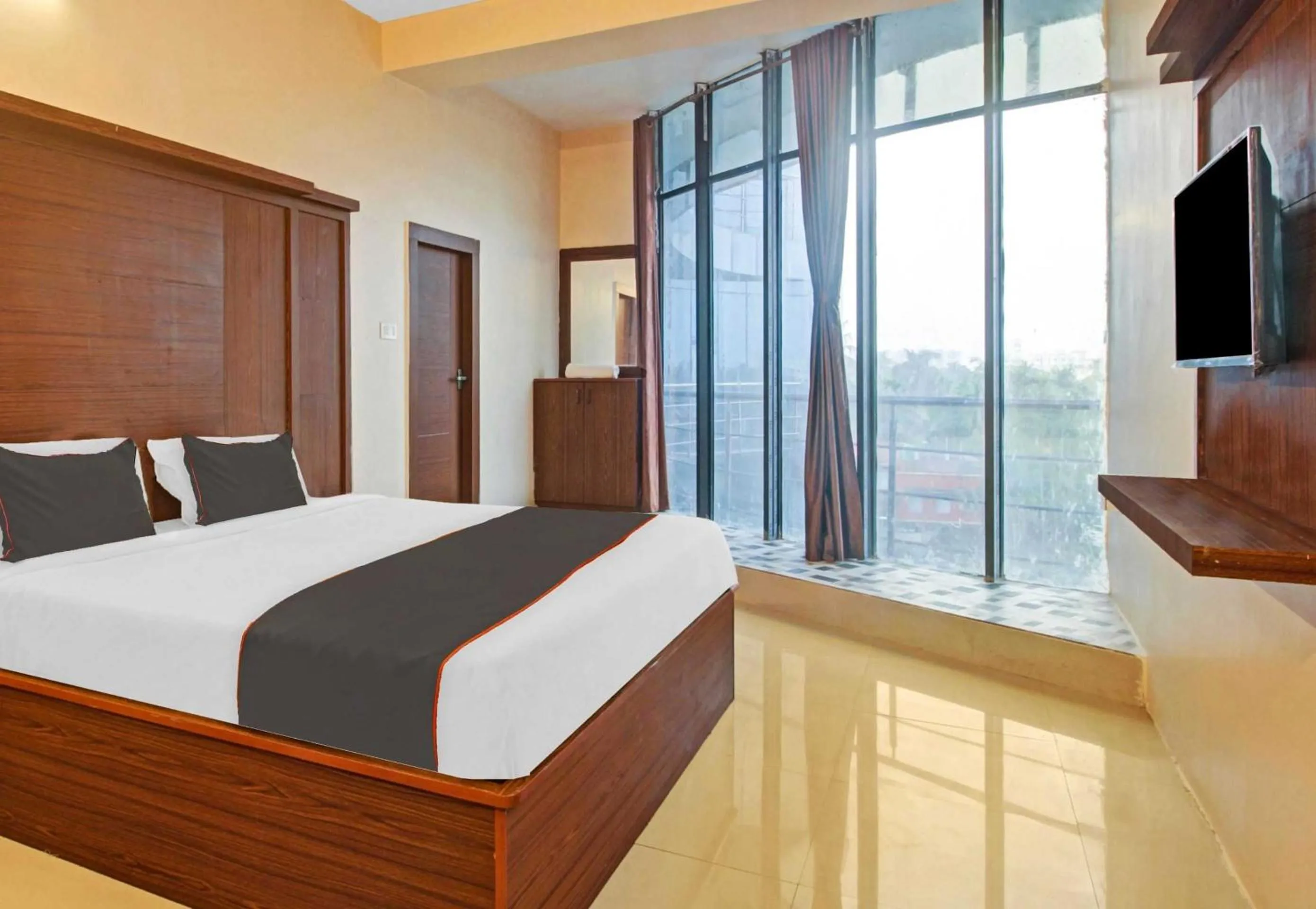 Bedroom, Bed in Super Collection O Hotel Aqua Villa Near Netaji Subhash Chandra Bose International Airport
