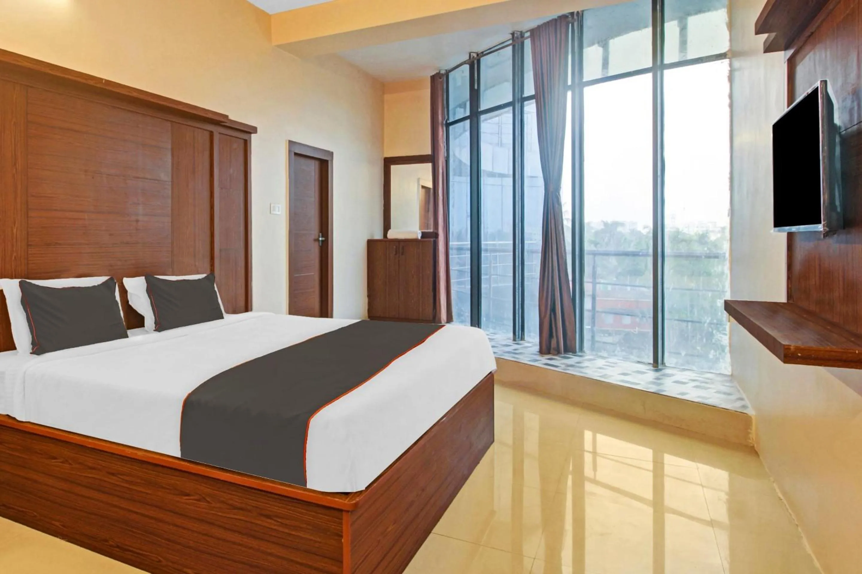 Bedroom, Bed in Super Collection O Hotel Aqua Villa Near Netaji Subhash Chandra Bose International Airport