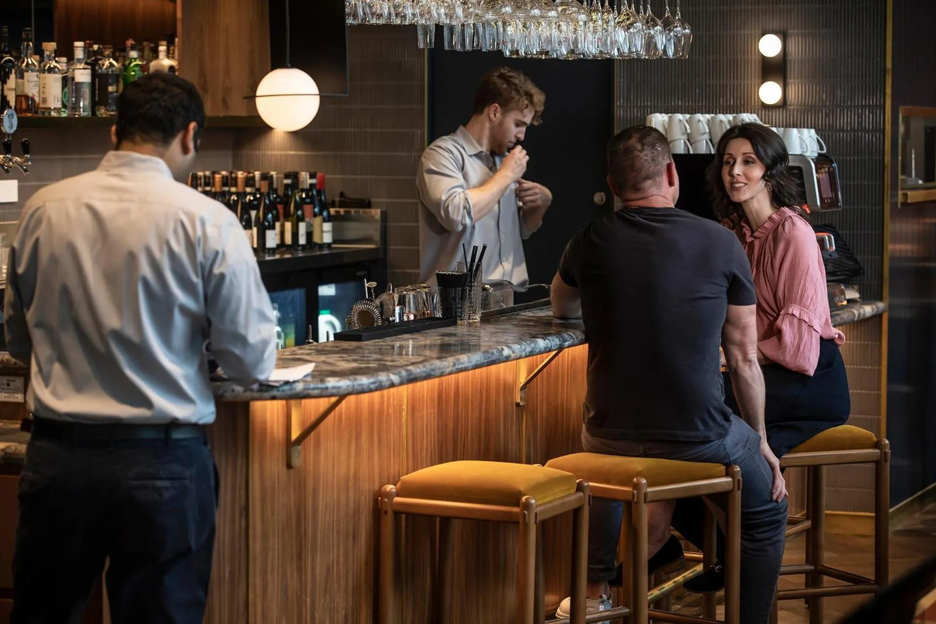 Lounge or bar in voco Auckland City Centre by IHG