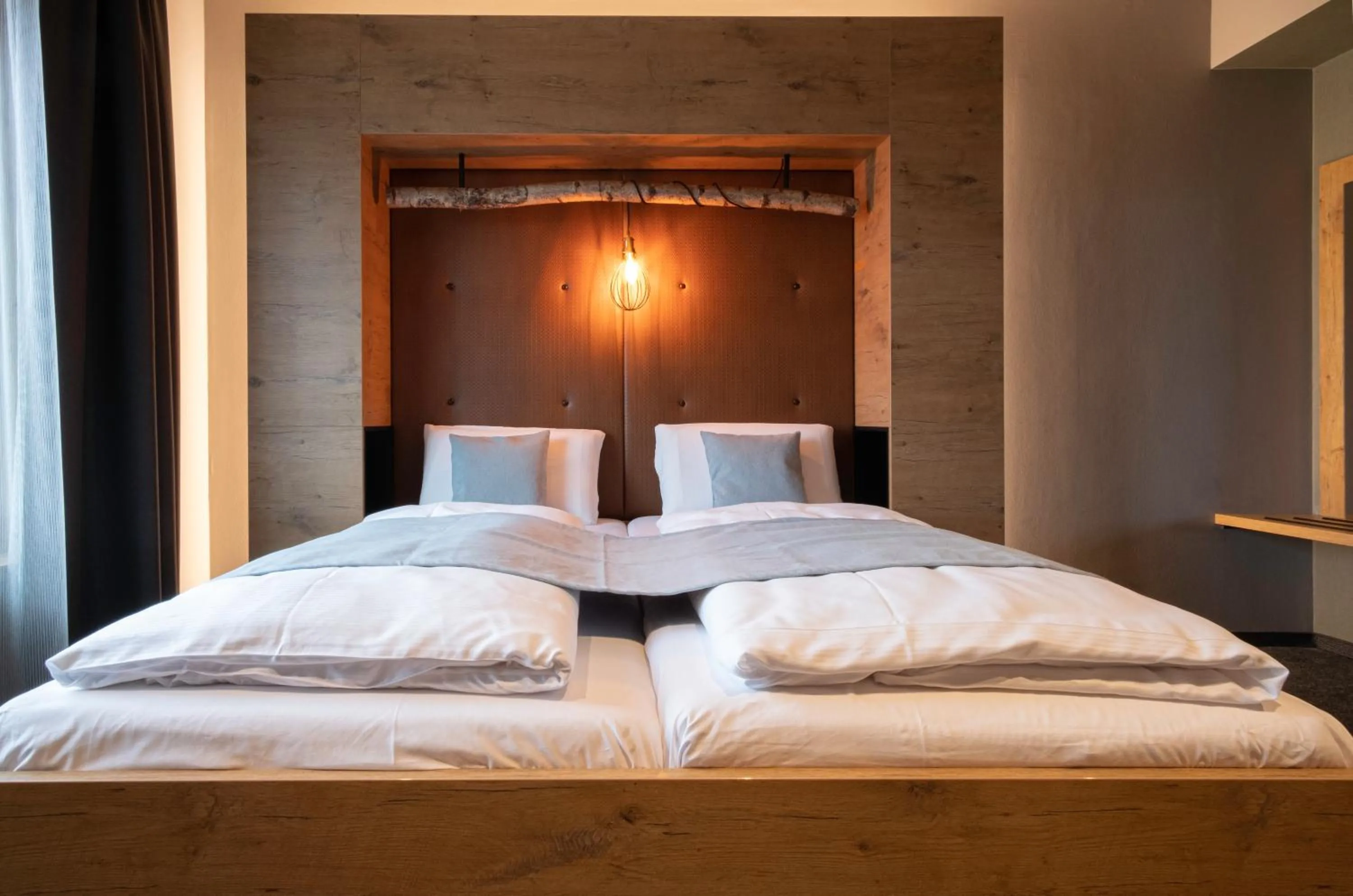 Bed in RiKu HOTEL Reutlingen