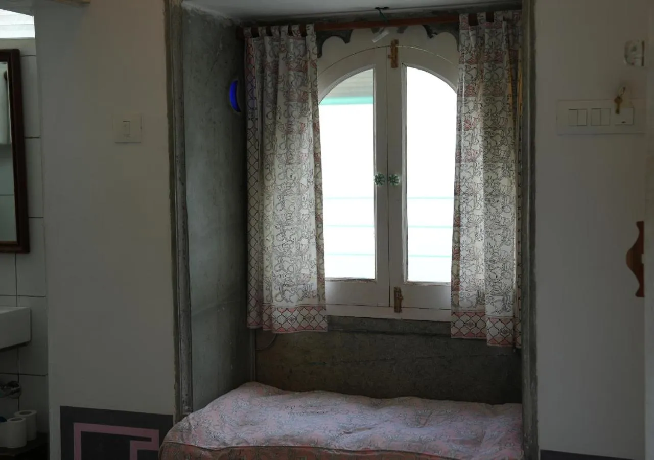 Decorative detail, Bed in Little Garden Guest House