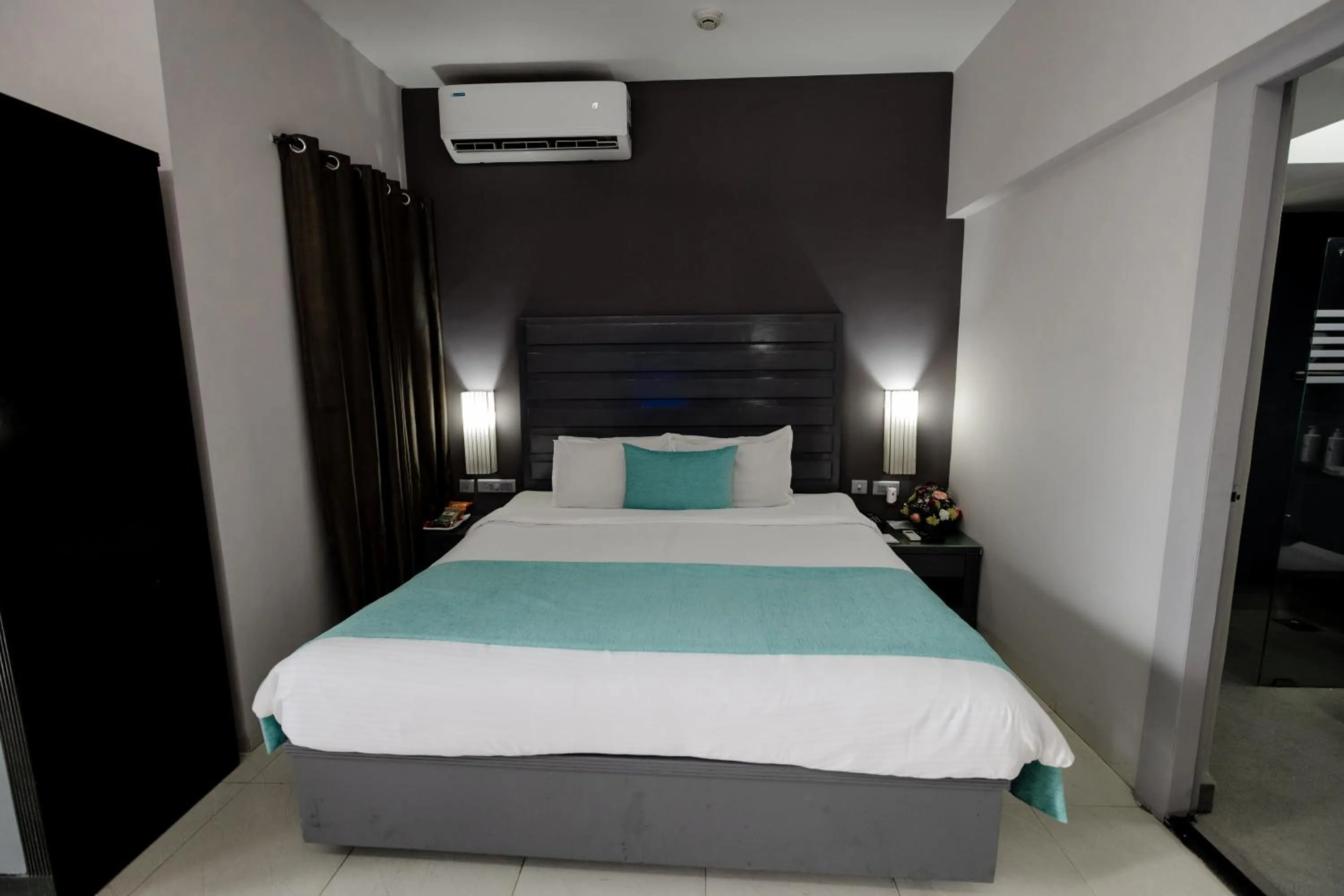 Pool view, Bed in Regenta Baywatch Resort, Goa