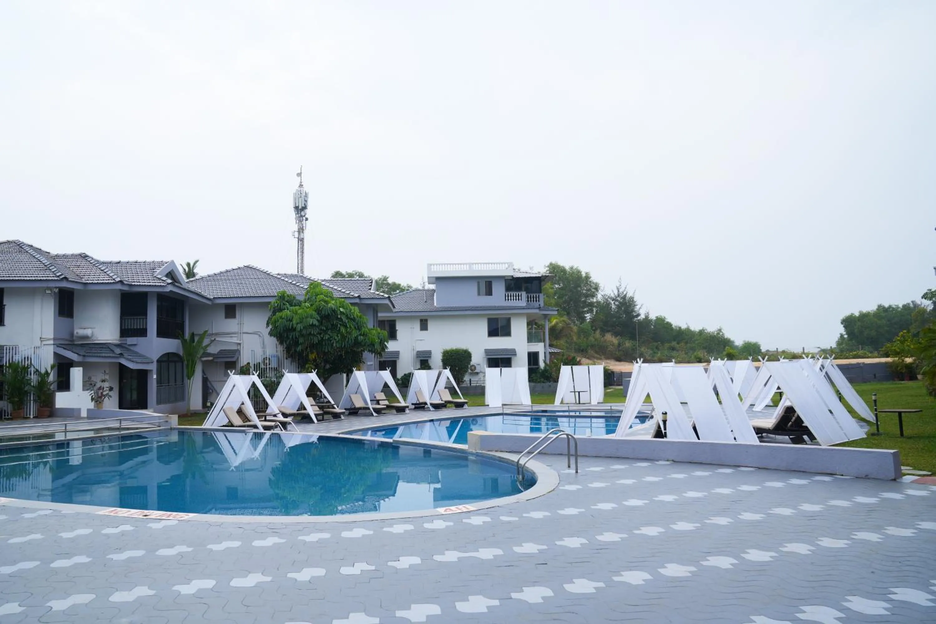 Swimming pool in Regenta Baywatch Resort, Goa