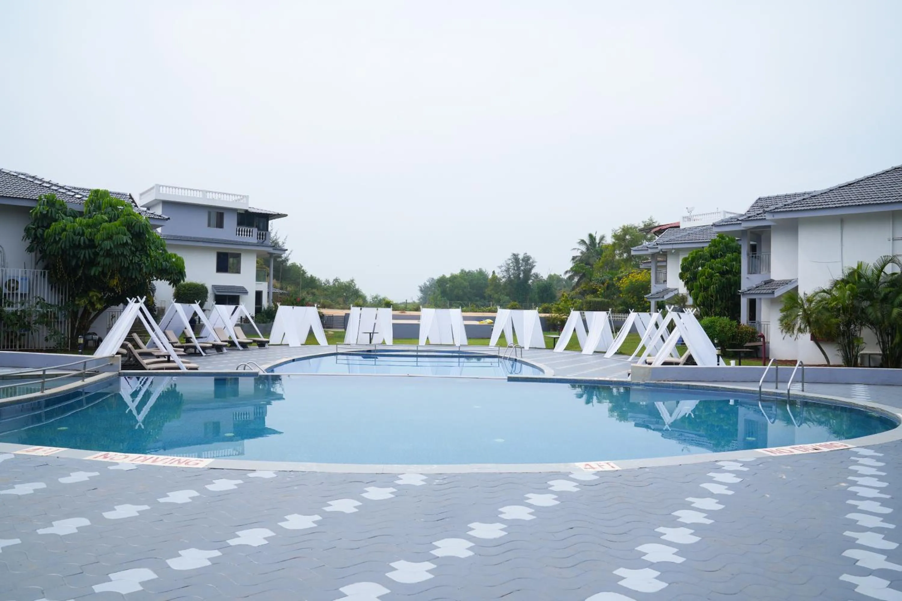 Swimming pool in Regenta Baywatch Resort, Goa