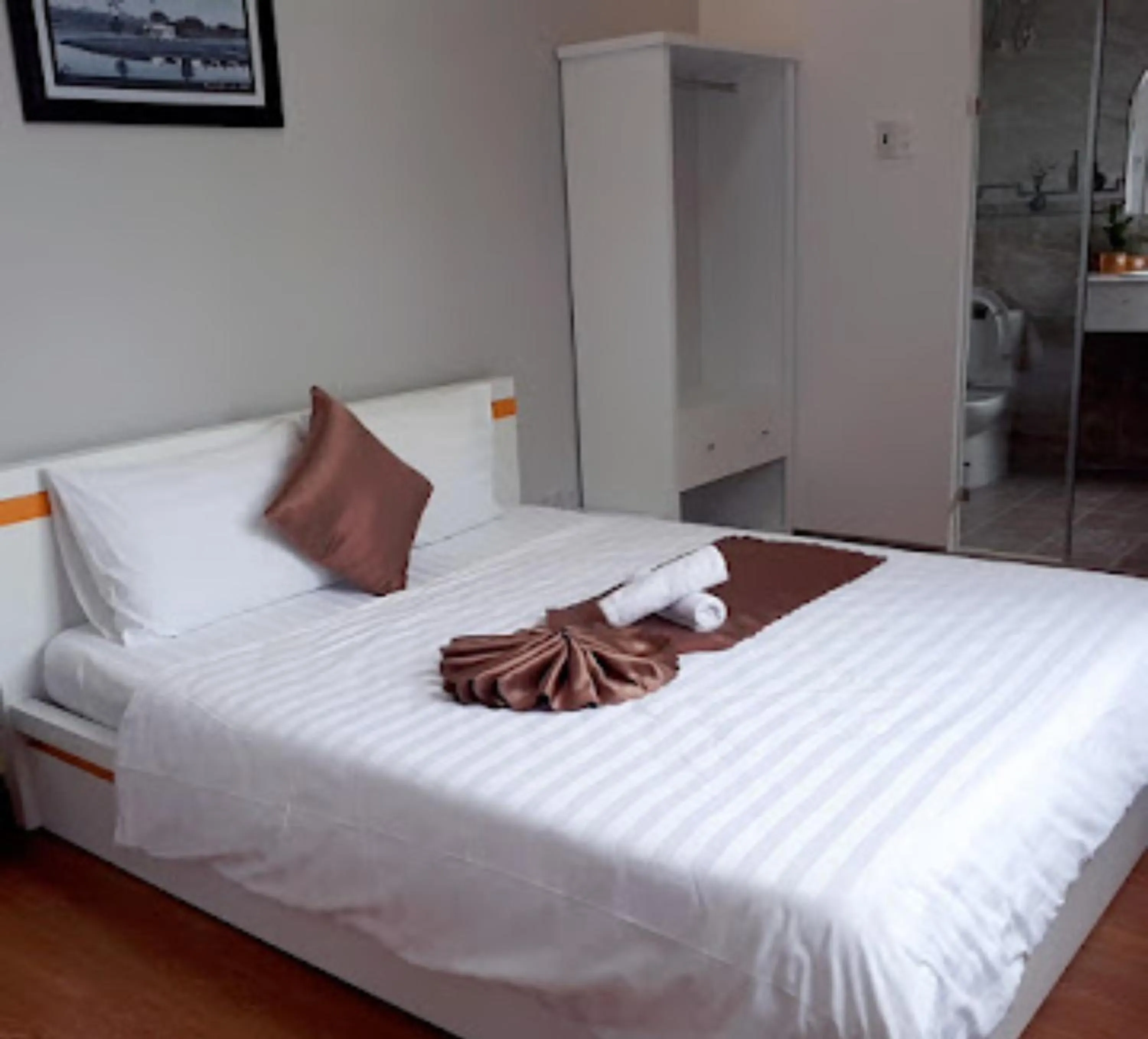 Bed in Minh Quan Hotel