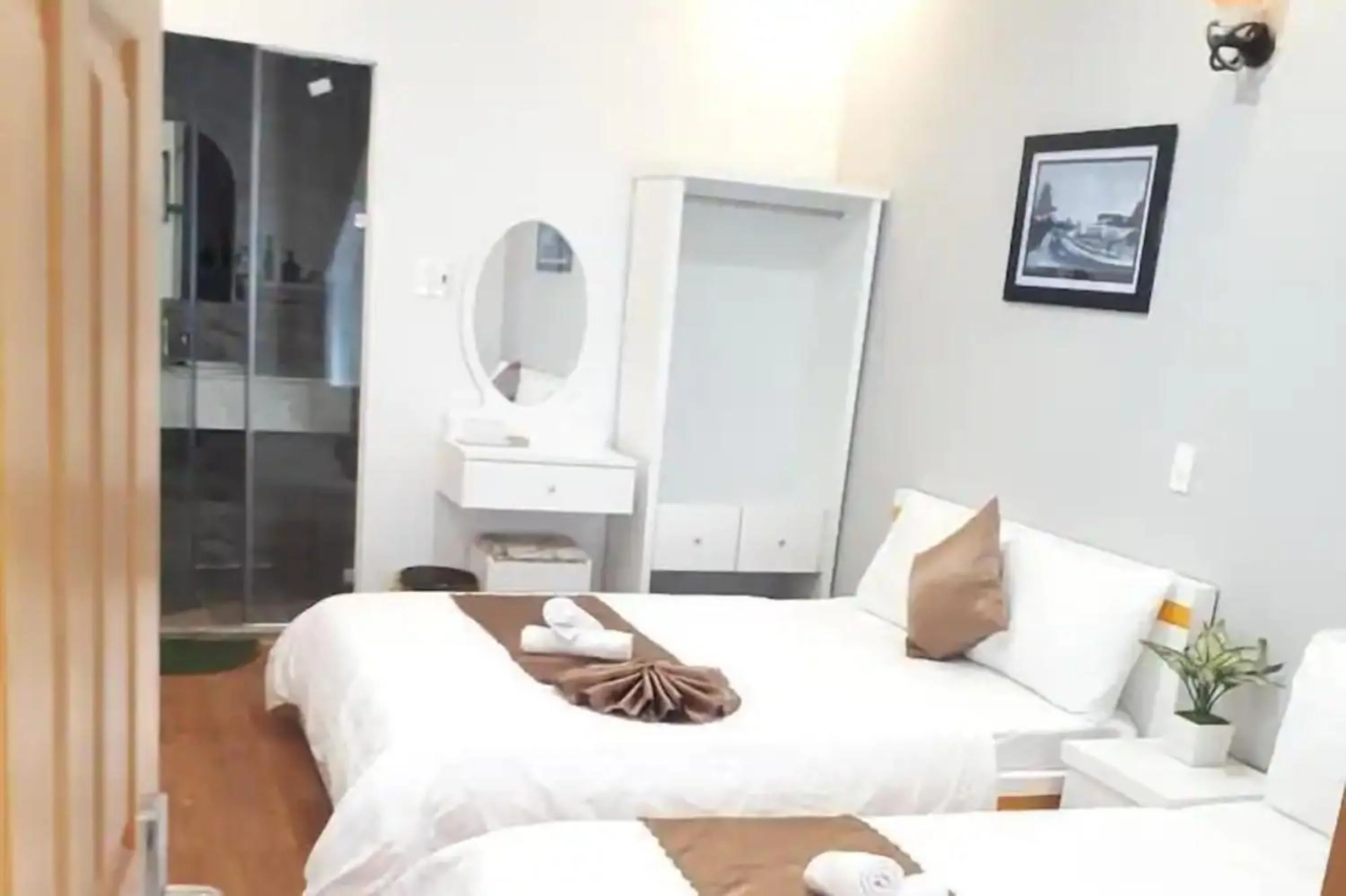 Photo of the whole room, Bed in Minh Quan Hotel