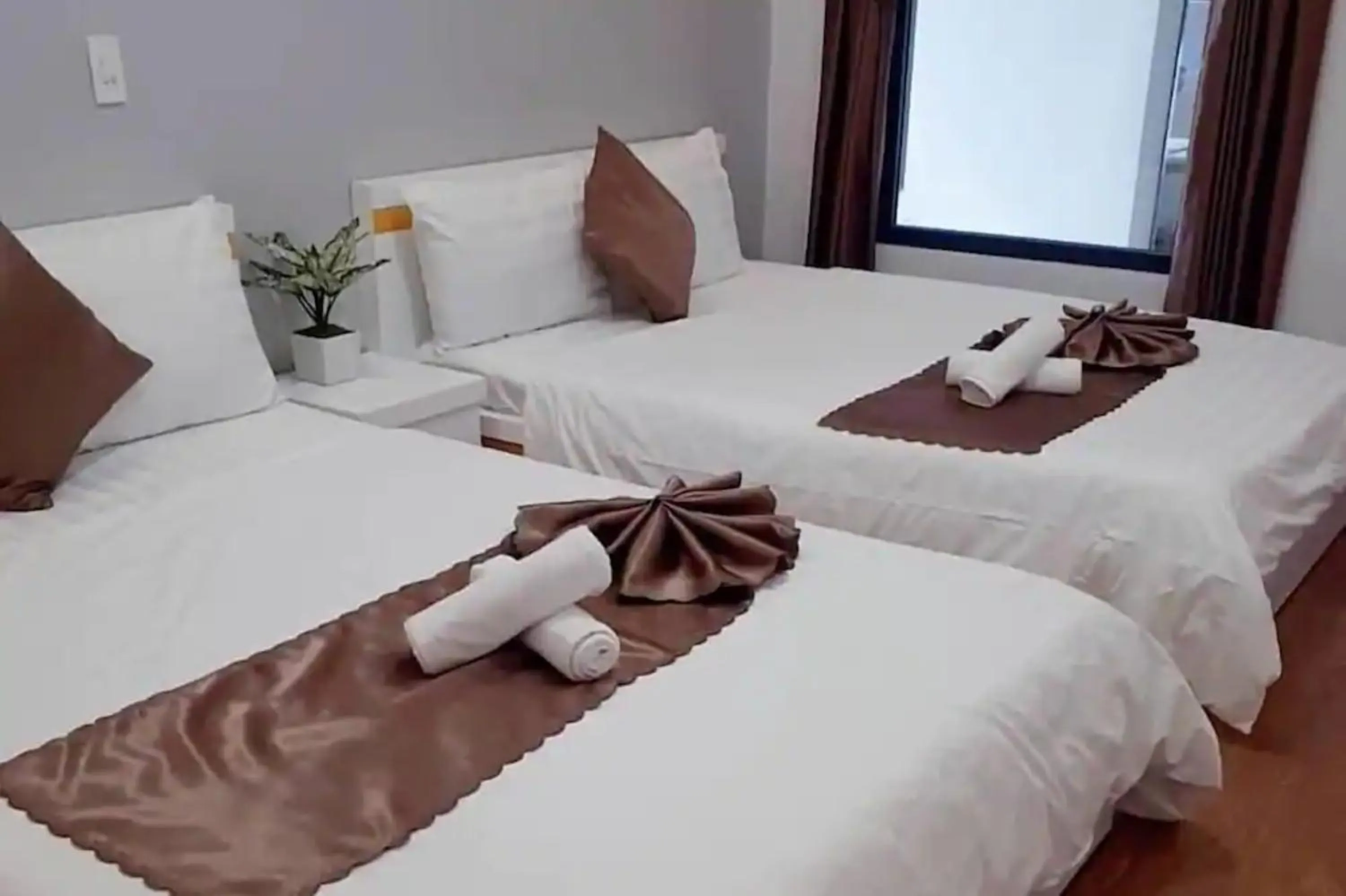 Photo of the whole room, Bed in Minh Quan Hotel