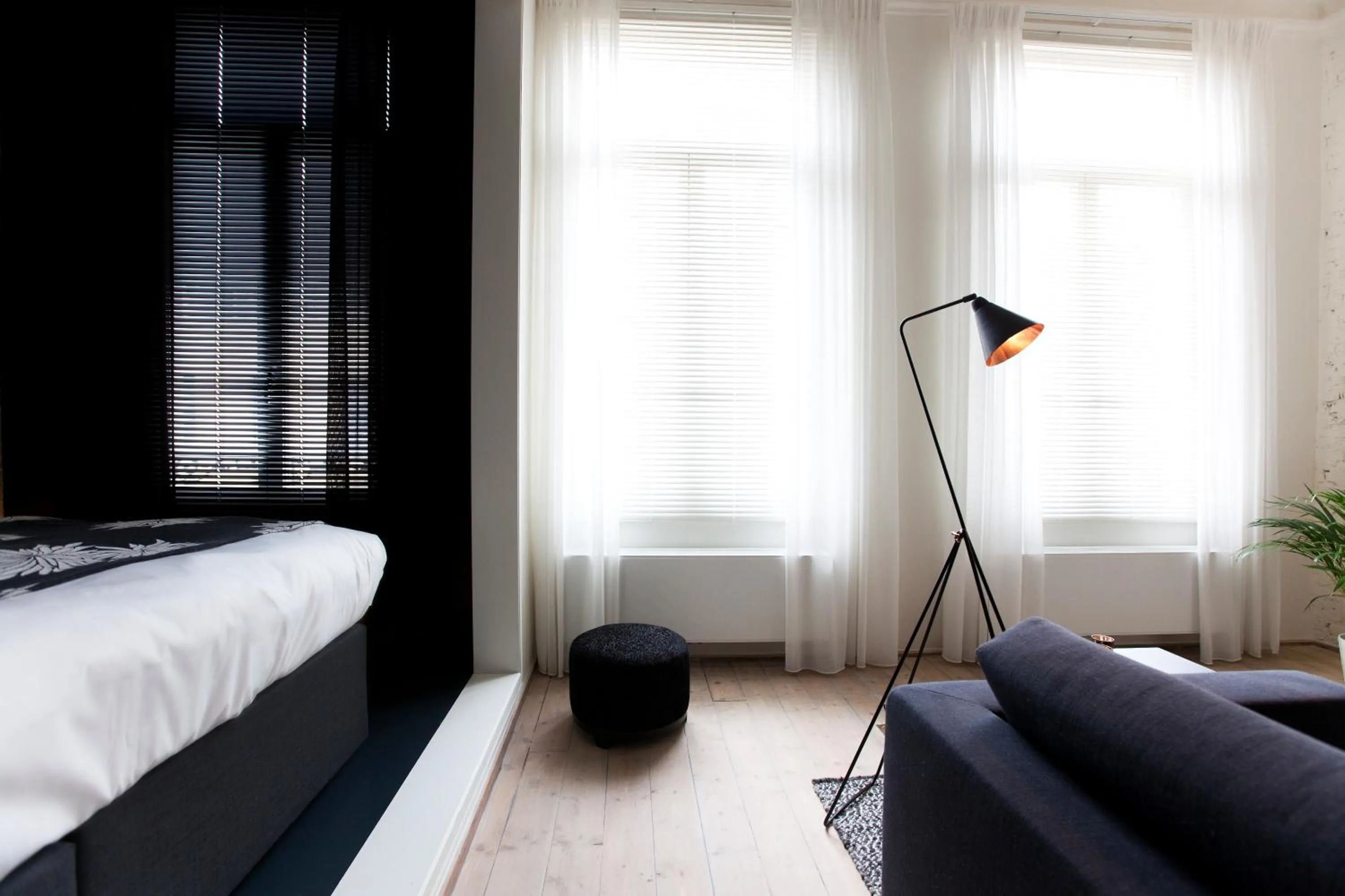 Living room, Bed in Maison Nationale City Flats & Suites