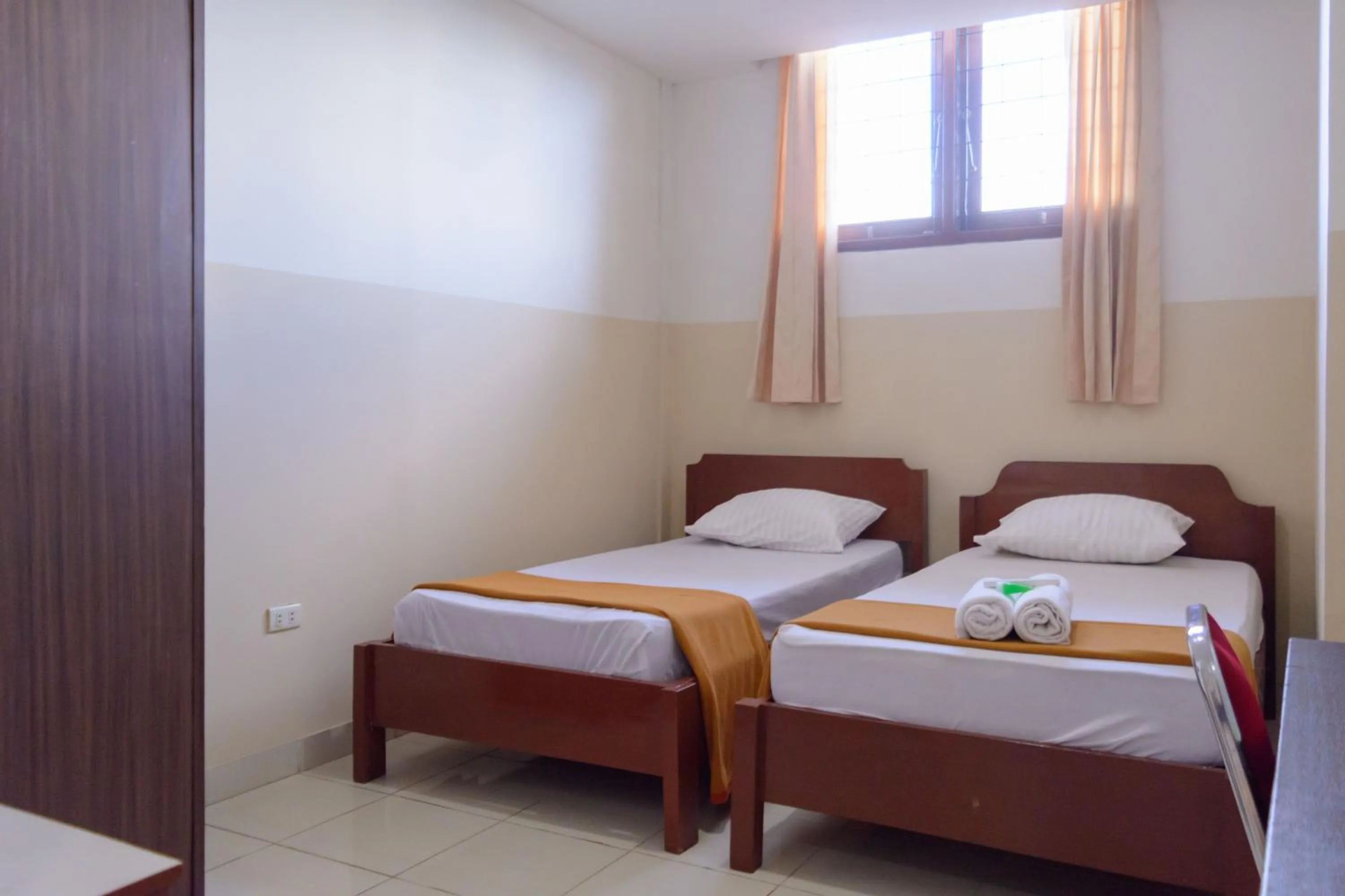 Photo of the whole room, Bed in Wisma Amandari