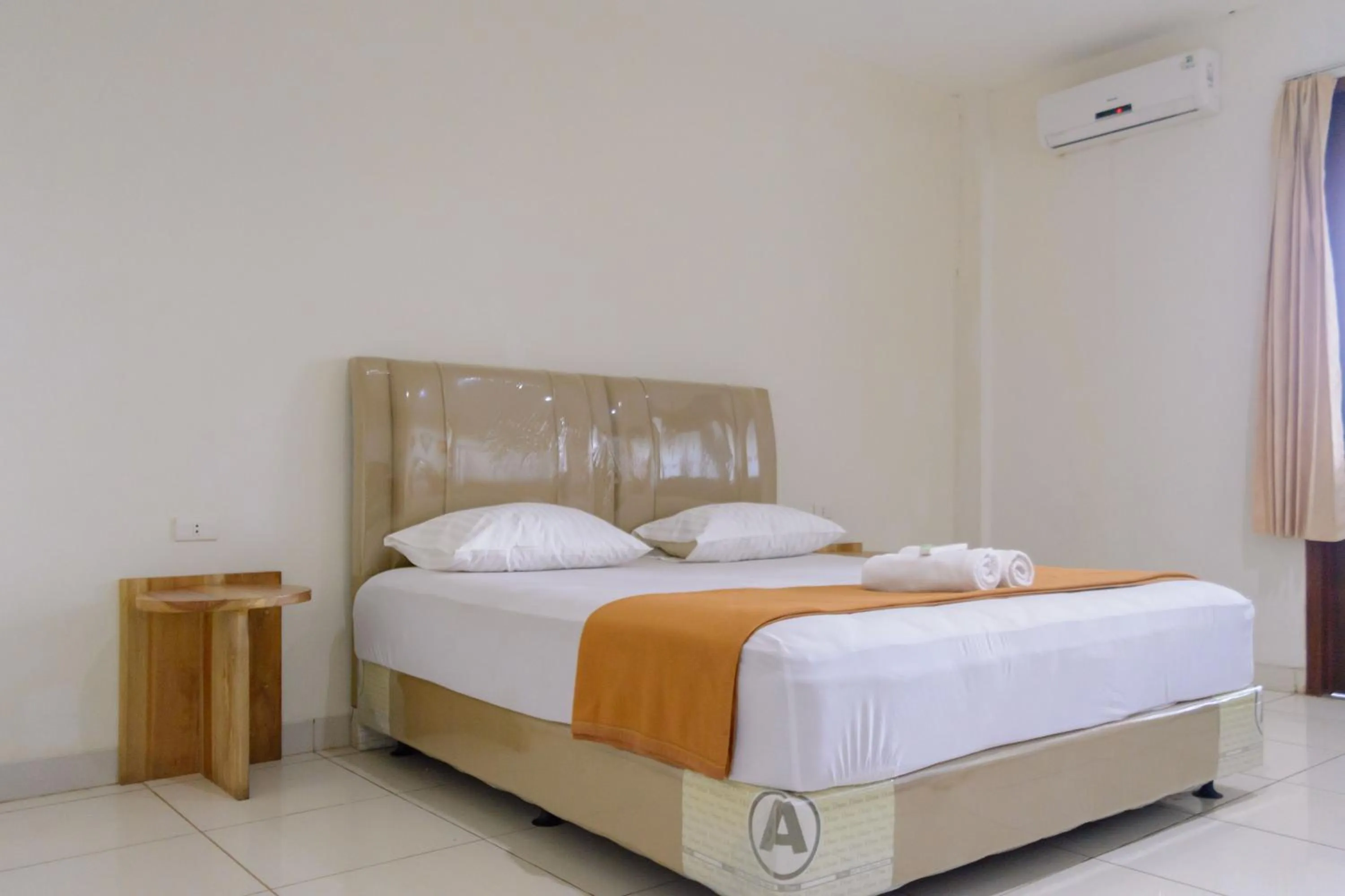 Photo of the whole room, Bed in Wisma Amandari