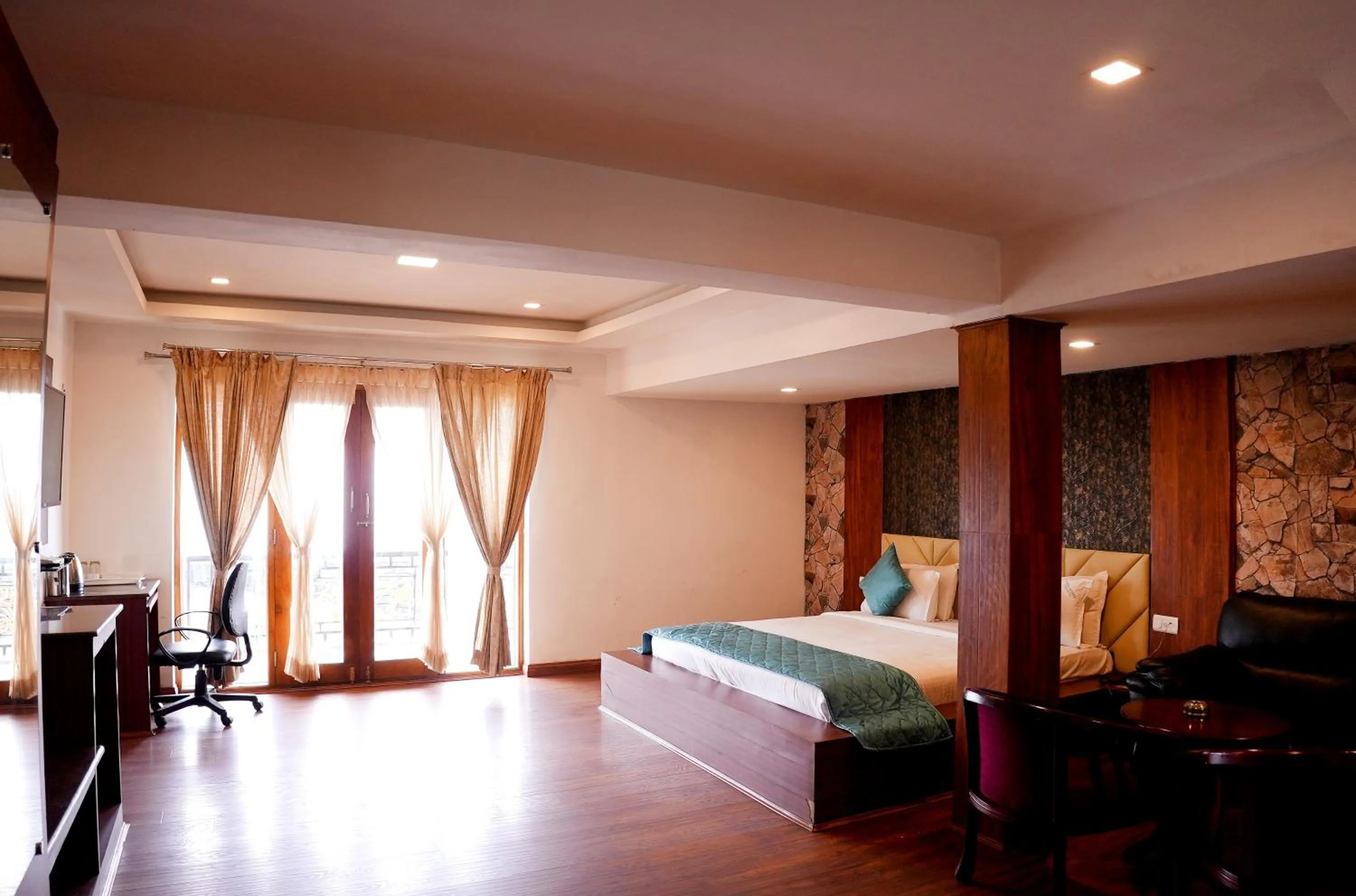 Photo of the whole room, Bed in Vista Suites Doddabetta Ooty By Bestinn Leisure
