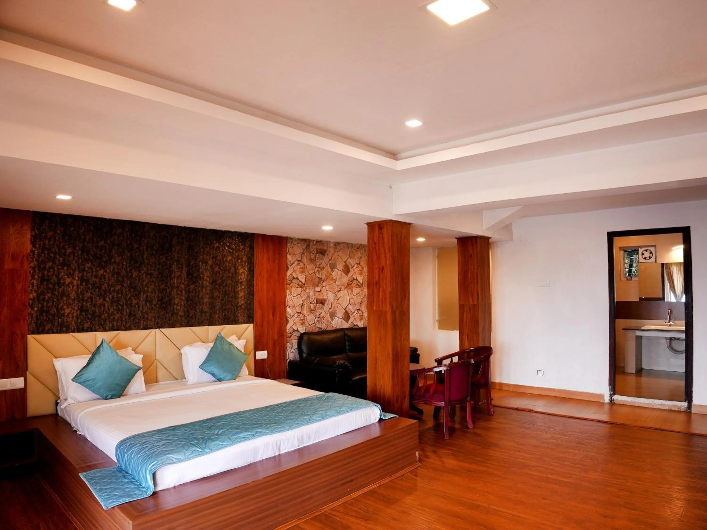 Living room, Bed in Vista Suites Doddabetta Ooty By Bestinn Leisure