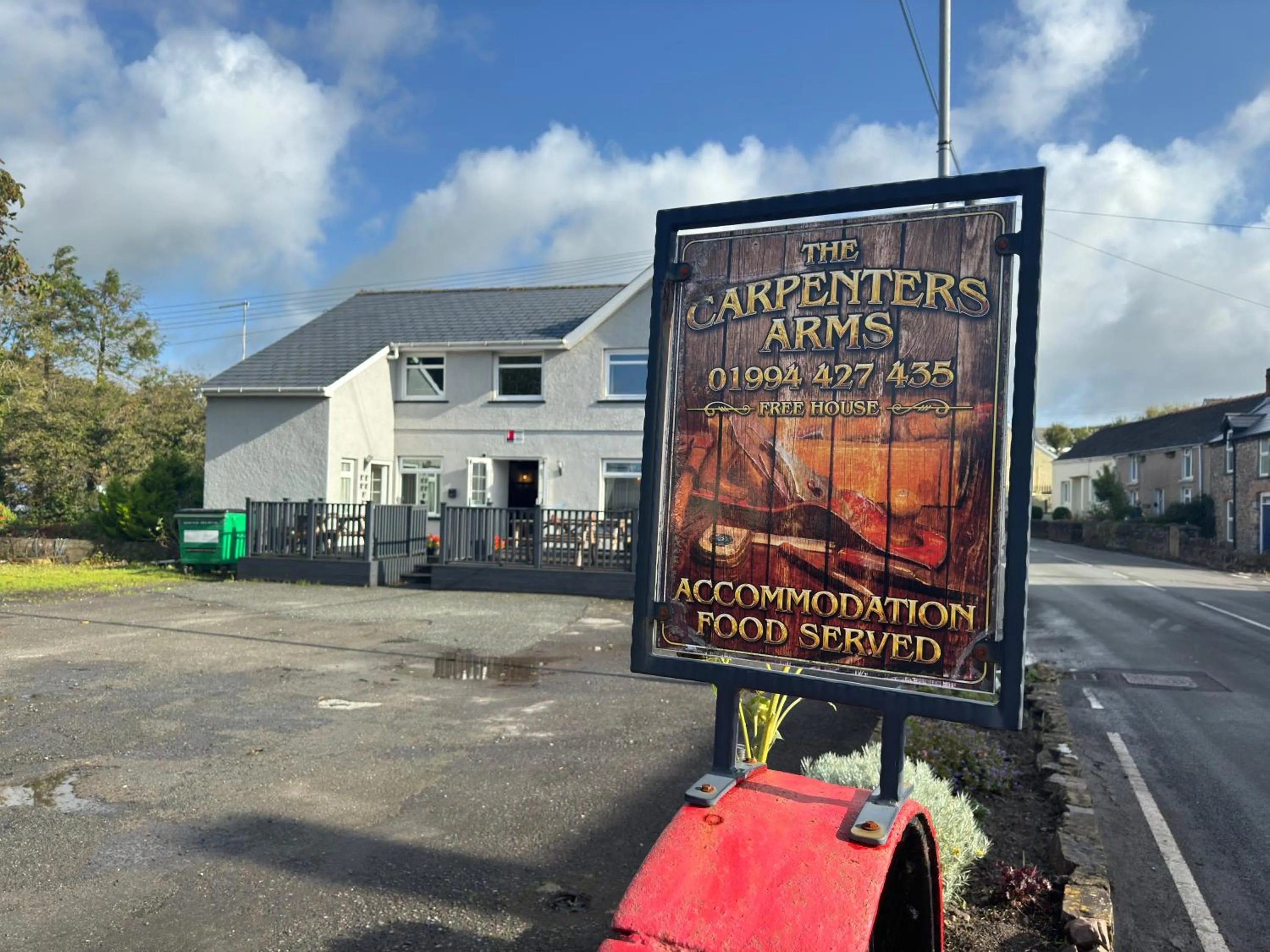 Logo/Certificate/Sign in The Carpenters Arms Rooms in Broadway, Laugharne
