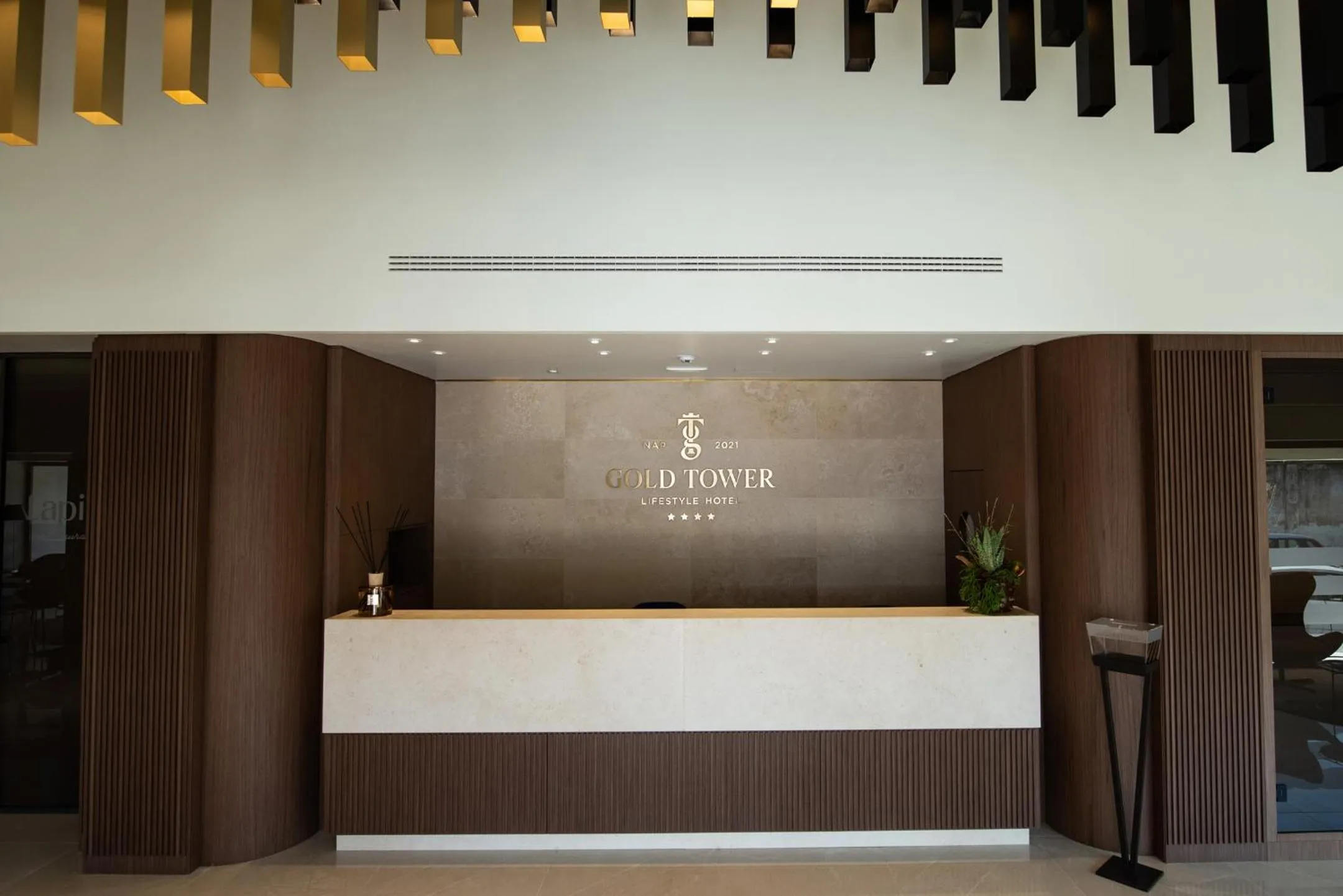 Property logo or sign in Gold Tower Lifestyle Hotel