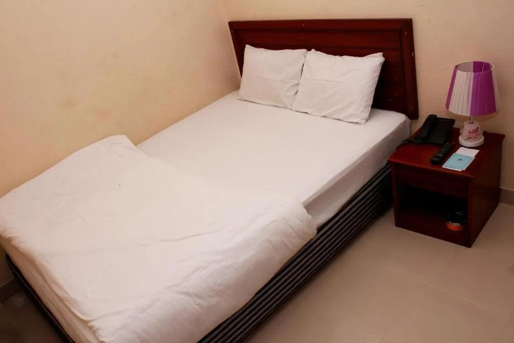 Bed in Lighthouse Family Retreat