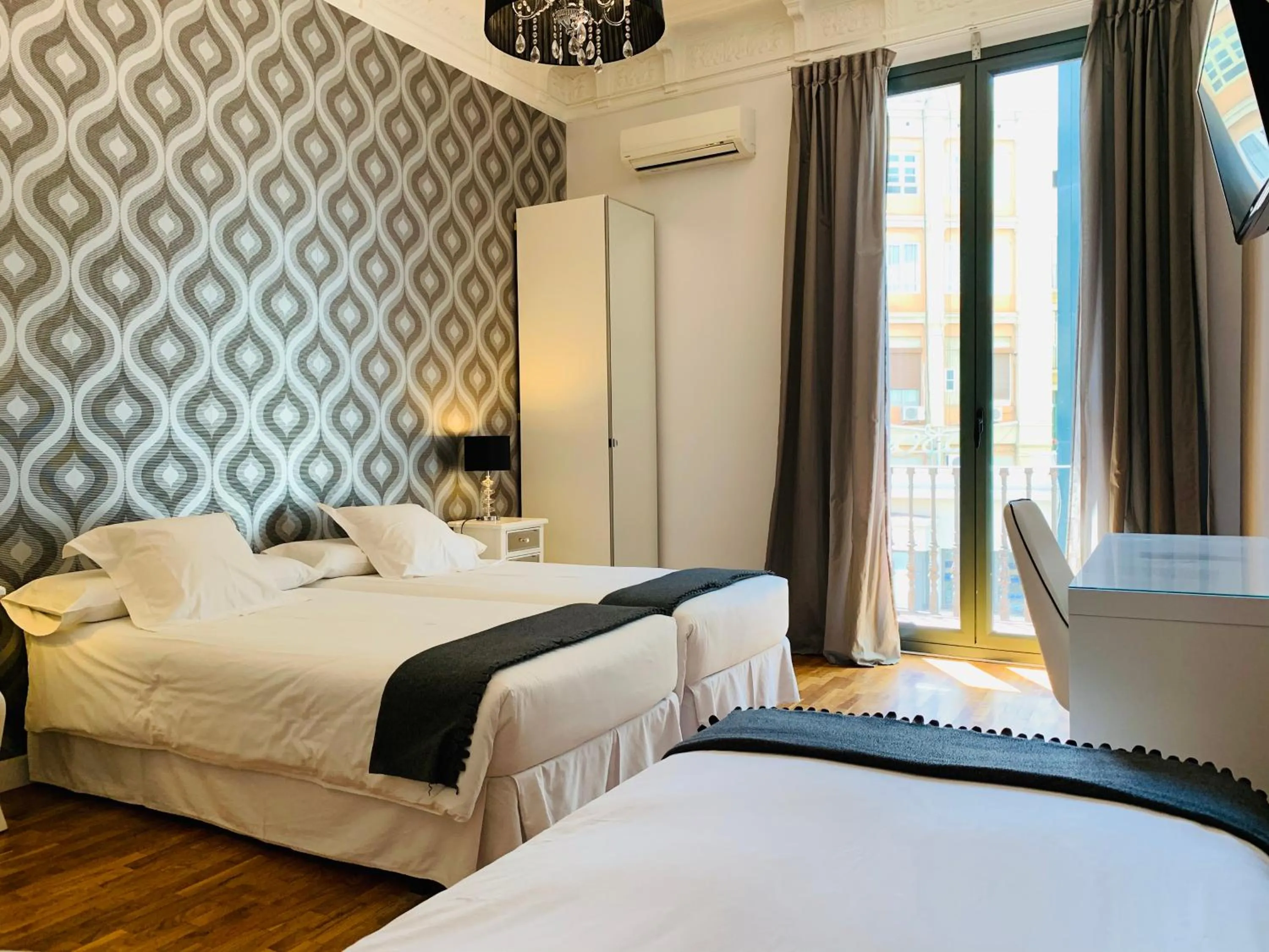 Bed in Super Balmes Guest House